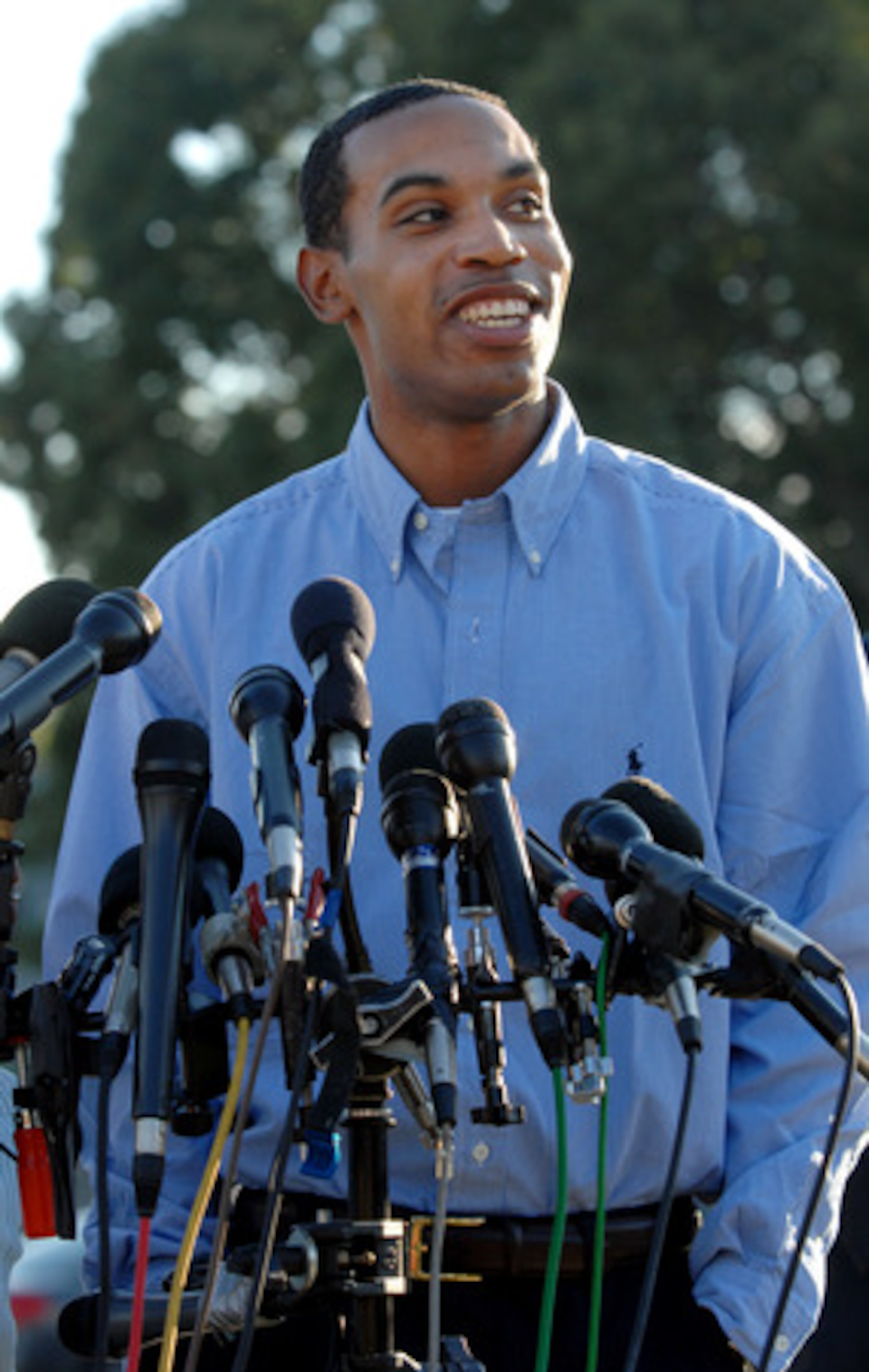 Wilson greets a throng of media outside the prison.