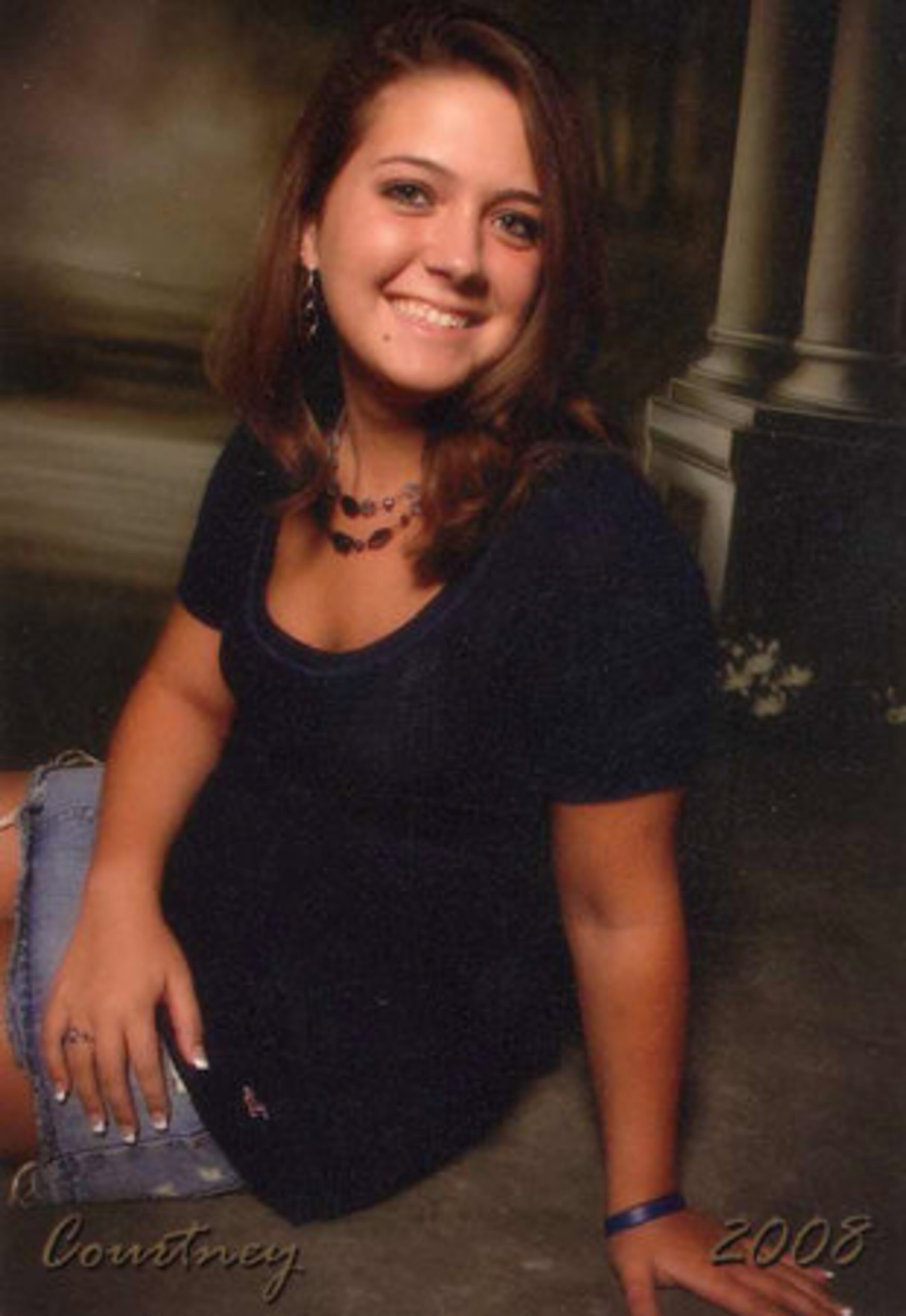 Courtney Stroud's famiy describes her as someone who loved life. This is her senior class photo.