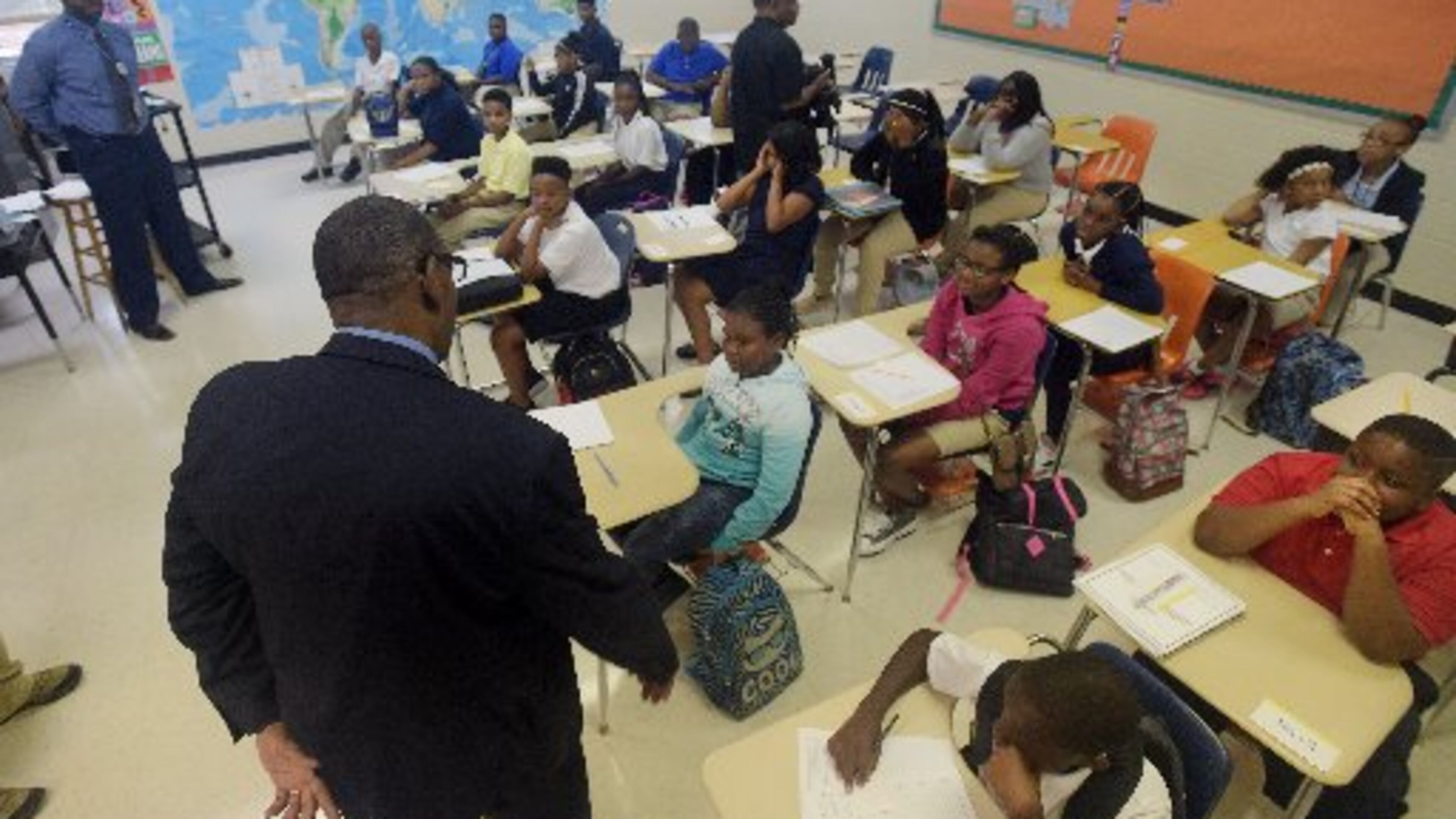 DeKalb County School District Superintendent Steve Green visits with students at Chapel Hill Middle School on the first day of school in 2015. AJC FILE PHOTO