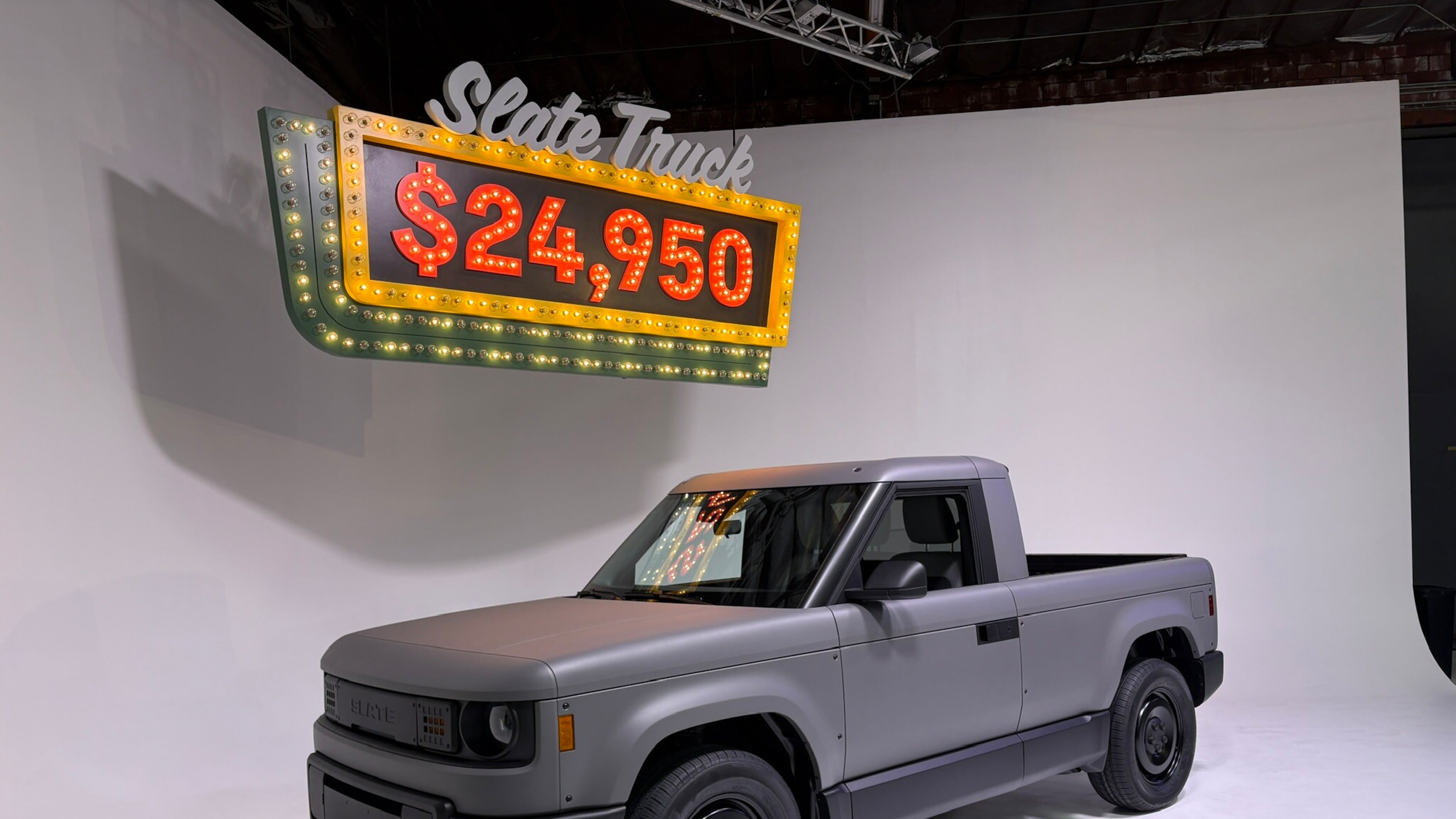 The Slate Truck is a rear-wheel-drive EV with a 205-mile range that can be transformed from a two-seat pickup into a five-seat SUV. Standard equipment, however, does not incude a center armrest or a radio. (Courtesy of Slate)