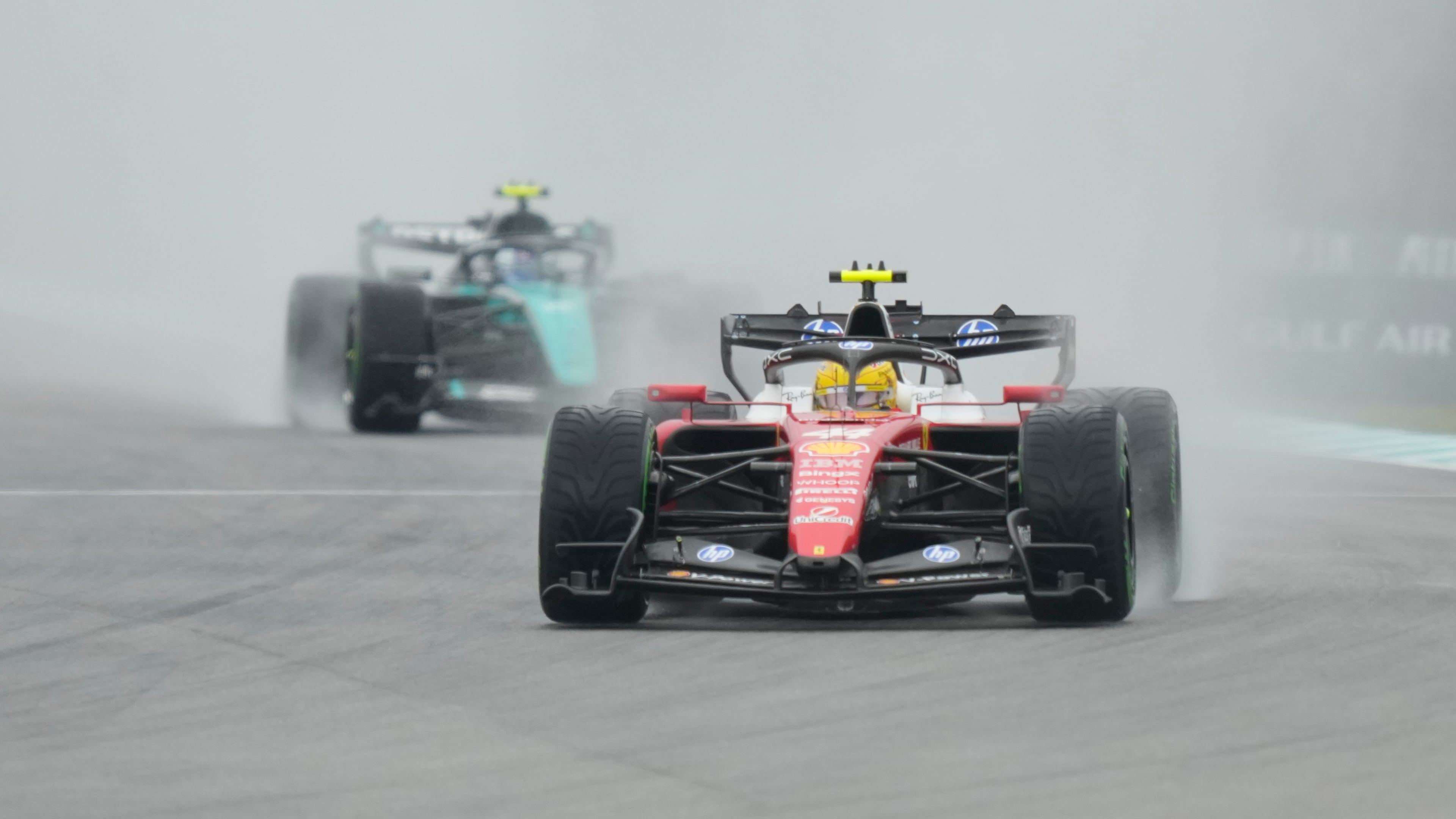 Ferrari driver Lewis Hamilton of Britain steers his car during the formation lap prior to the delayed start of the Bahrain Grand Prix in Sepang, Malaysia, Sunday, Oct. 4, 2026. (AP Photo/Aijaz Rahi)