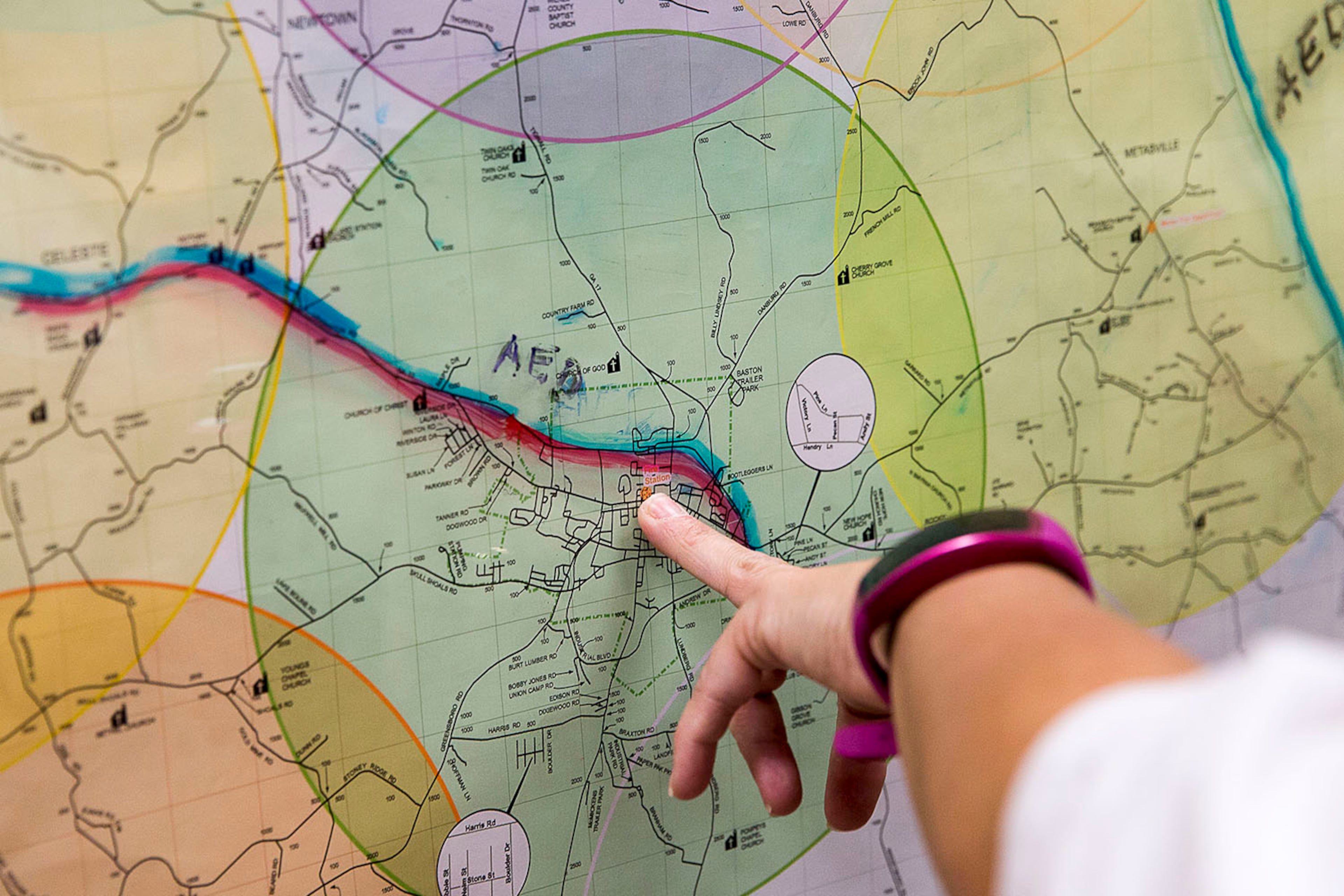 10/03/2019 -- Washington, Georgia -- Wilkes County Deputy EMA Director and paramedic Amy Howard points to a map to show the proximity of the Washington Fire Department and Wilkes County EMS Station 1 while at the station in Washington, Thursday, October 3, 2019. (Alyssa Pointer/Atlanta Journal Constitution)