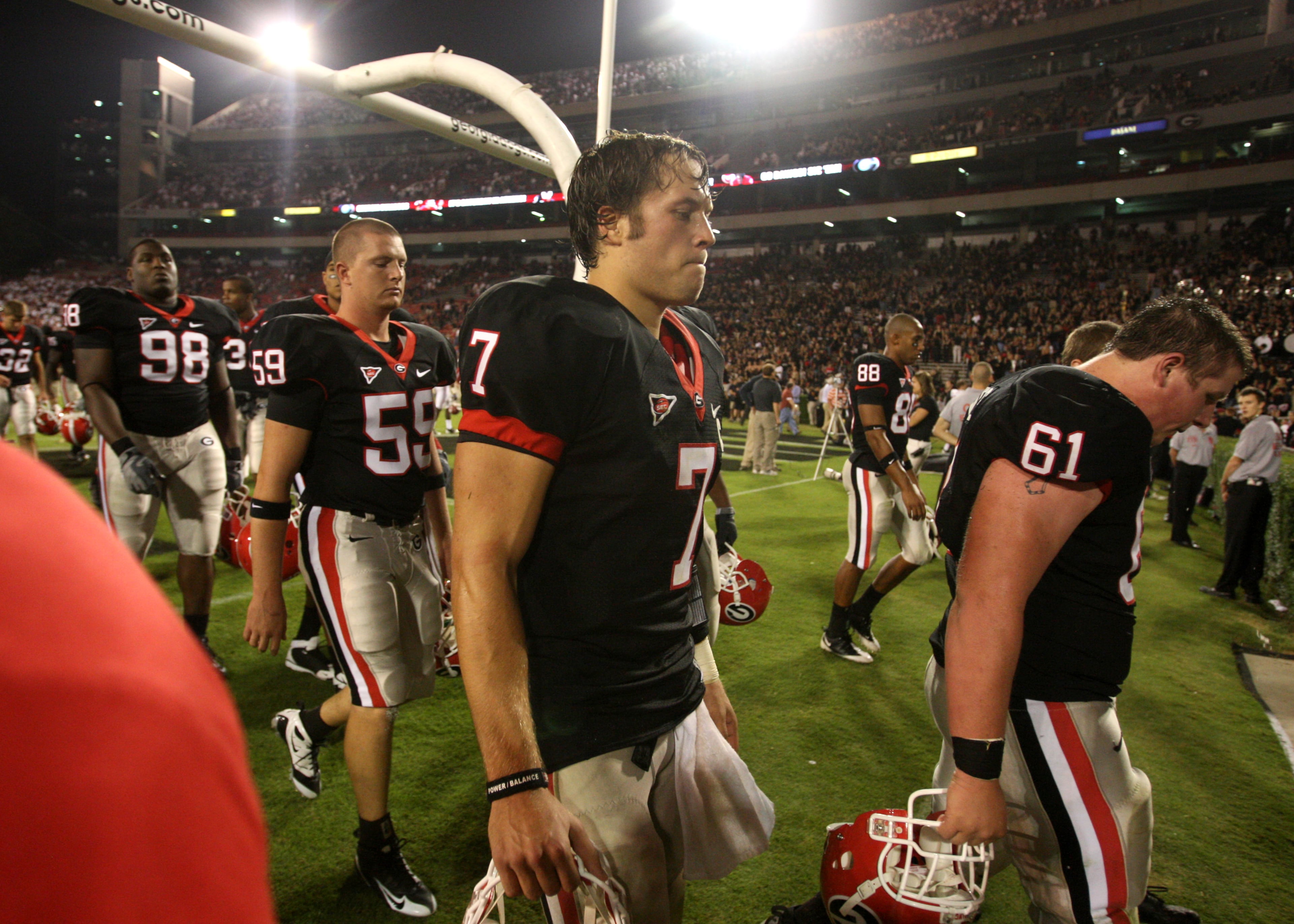 Georgia quarterback Matthew Stafford (7) and teammates walk off the field following a 41-30 loss to Alabama in Athens on September 27, 2008. Brant Sanderlin/ bsanderlin@ajc.com