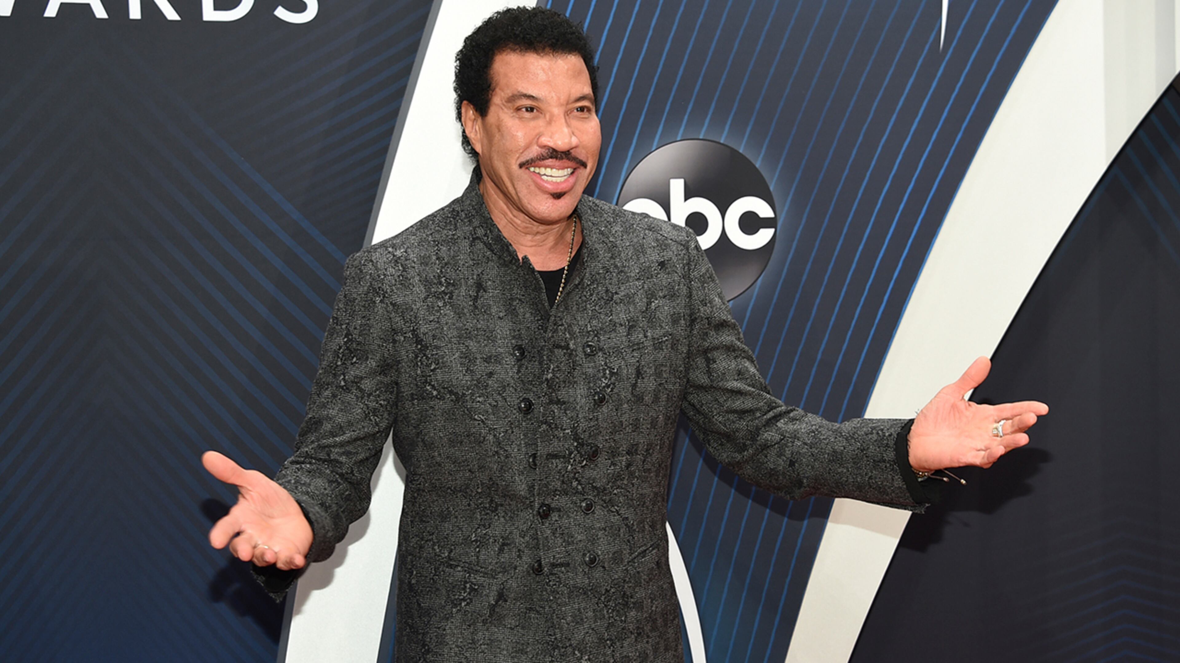 Lionel Richie arrives at the 52nd annual CMA Awards at Bridgestone Arena on Wednesday, Nov. 14, 2018, in Nashville, Tenn. (Photo by Evan Agostini/Invision/AP)