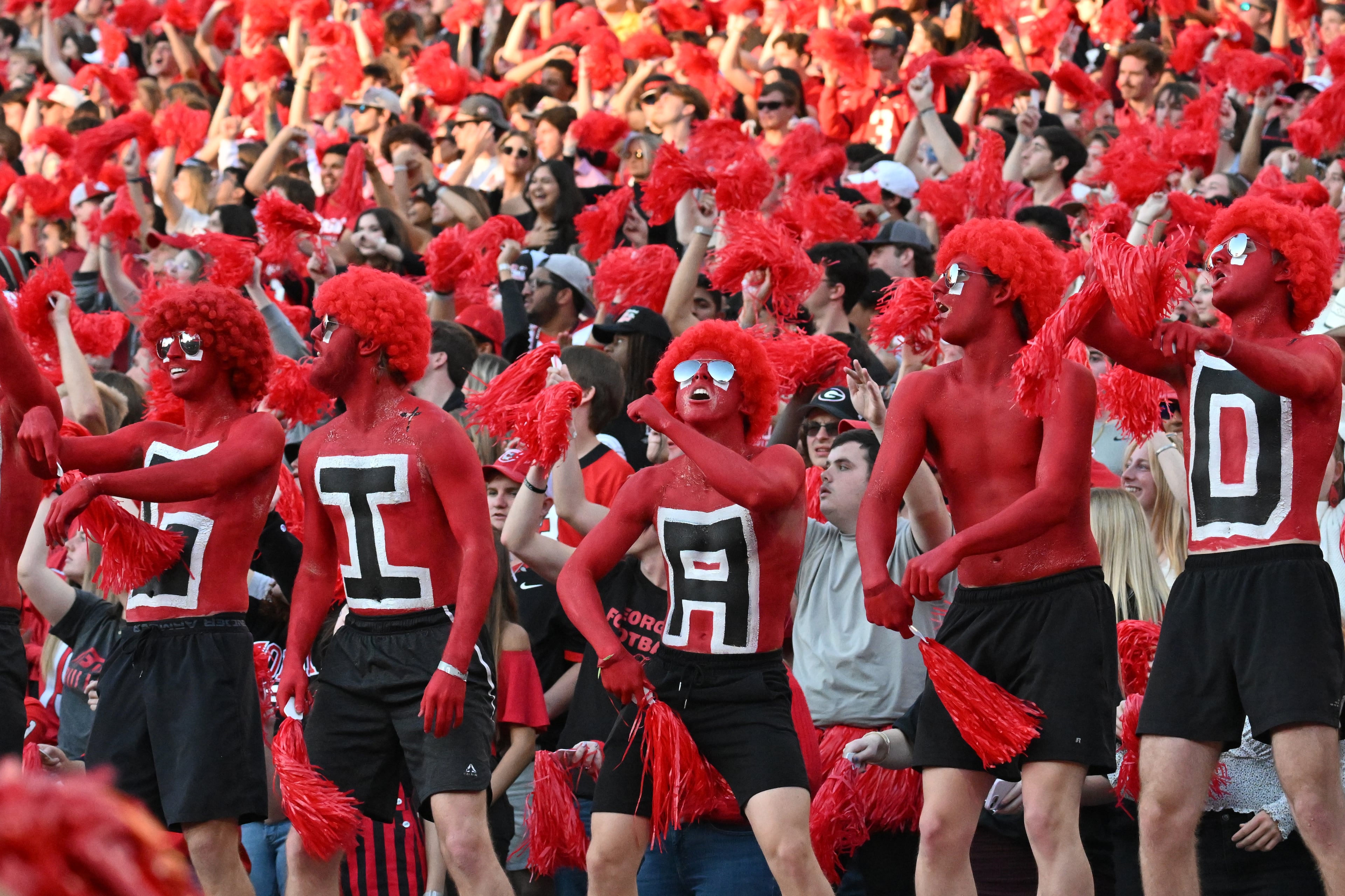 Georgia fans cheer during the second half in an NCAA football game at Sanford Stadium, Saturday, November 4, 2023, in Athens. Georgia won 30-21 over Missouri. (Hyosub Shin / Hyosub.Shin@ajc.com)