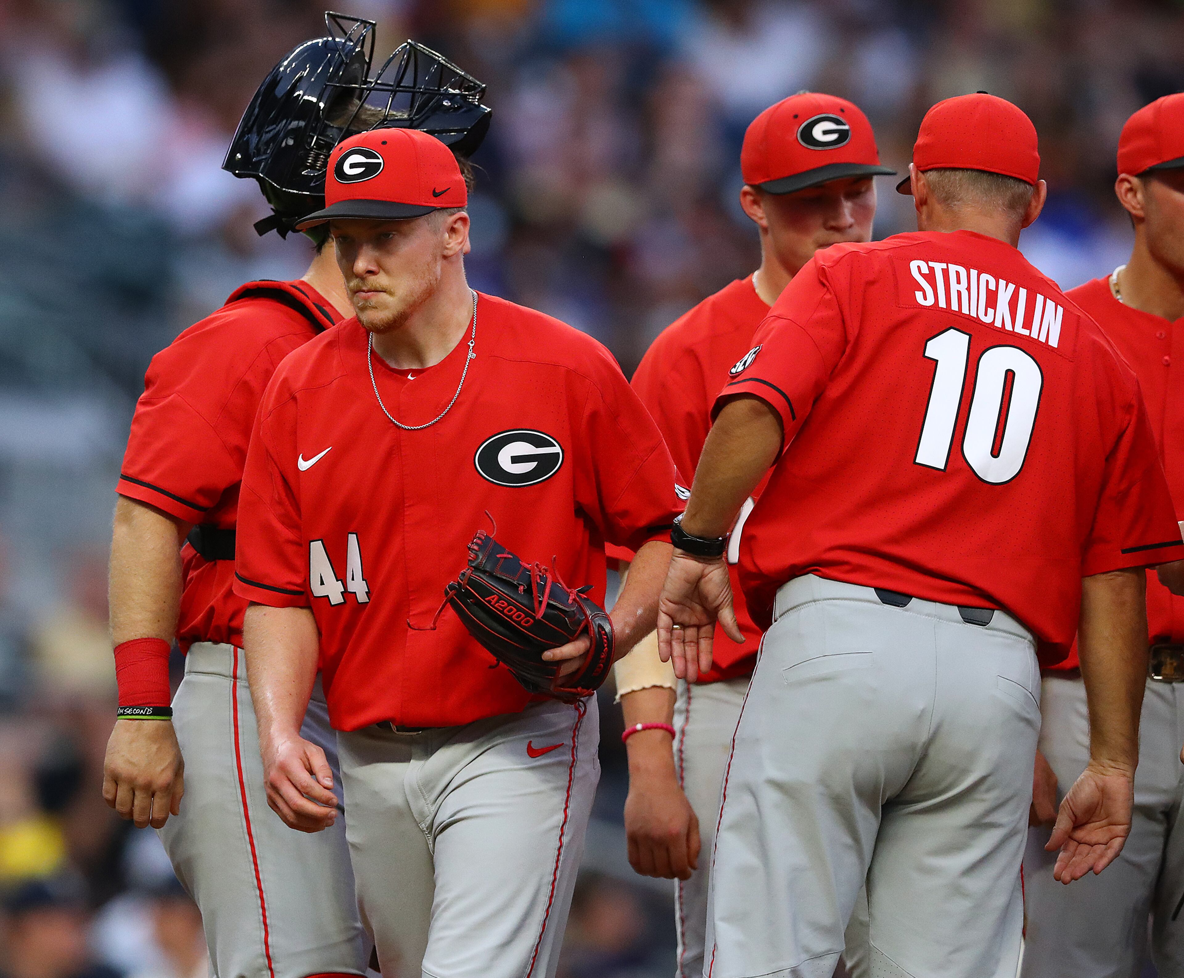 April 23, 2019 Atlanta: Georgia pitcher Tim Elliott is pulled from the game by head coach Scott Stricklin during the second inning when Georgia Tech scored five runs to take a 6-2 lead in the Spring Classic NCAA college baseball game at SunTrust Park on Tuesday, April 23, 2019, in Atlanta. Curtis Compton/ccompton@ajc.com