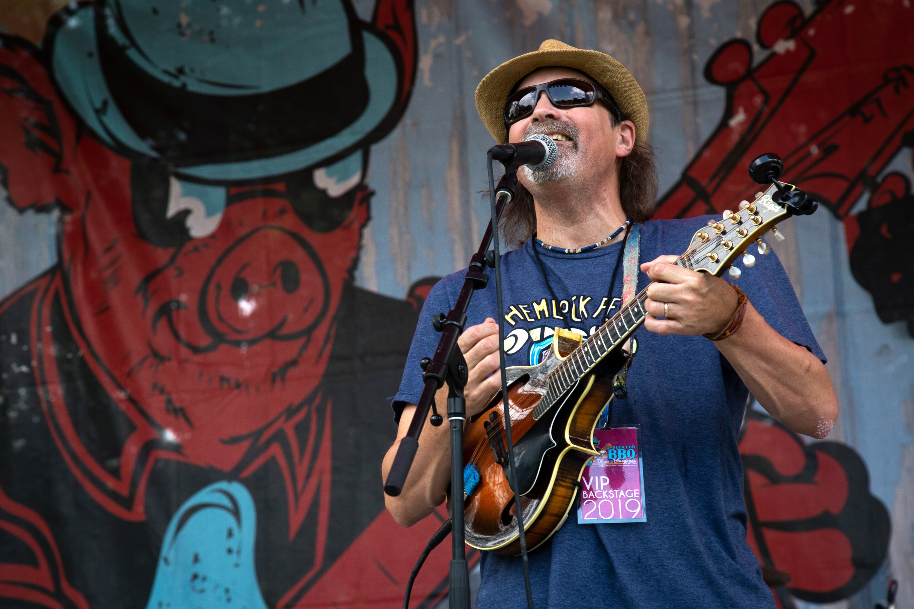 The mandolin player for the Honeywood band plays on the main stage during the 19th annual Decatur BBQ Blues & Bluegrass festival on Saturday, August 10, 2019. STEVE SCHAEFER / SPECIAL TO THE AJC
