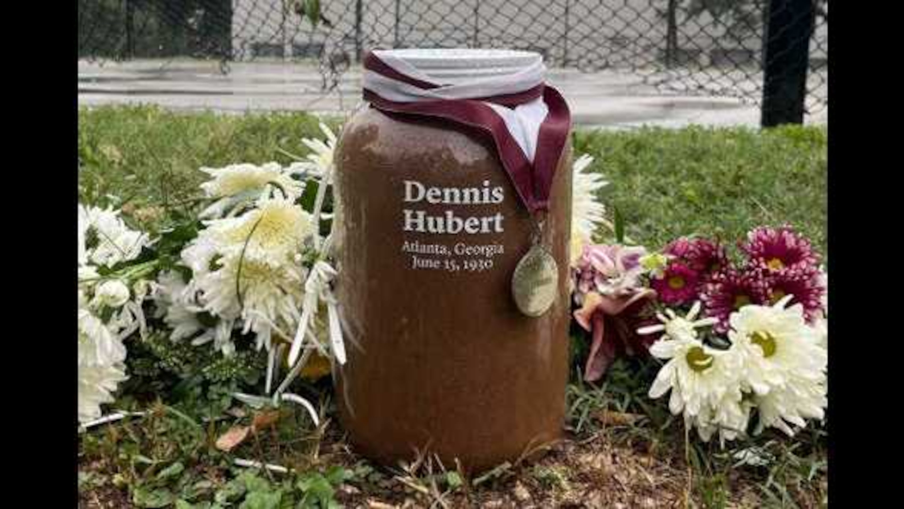This jar reflects the soil collected from the site where Dennis Hubert was lynched in 1930. Hubert was a sophomore at Morehouse College when he was lynched by a mob of seven white men who falsely accused the 18-year-old of insulting a white woman. Morehouse gave him a posthumous degree during its May 19, 2025 commencement ceremony. Photo Credit: Morehouse College.