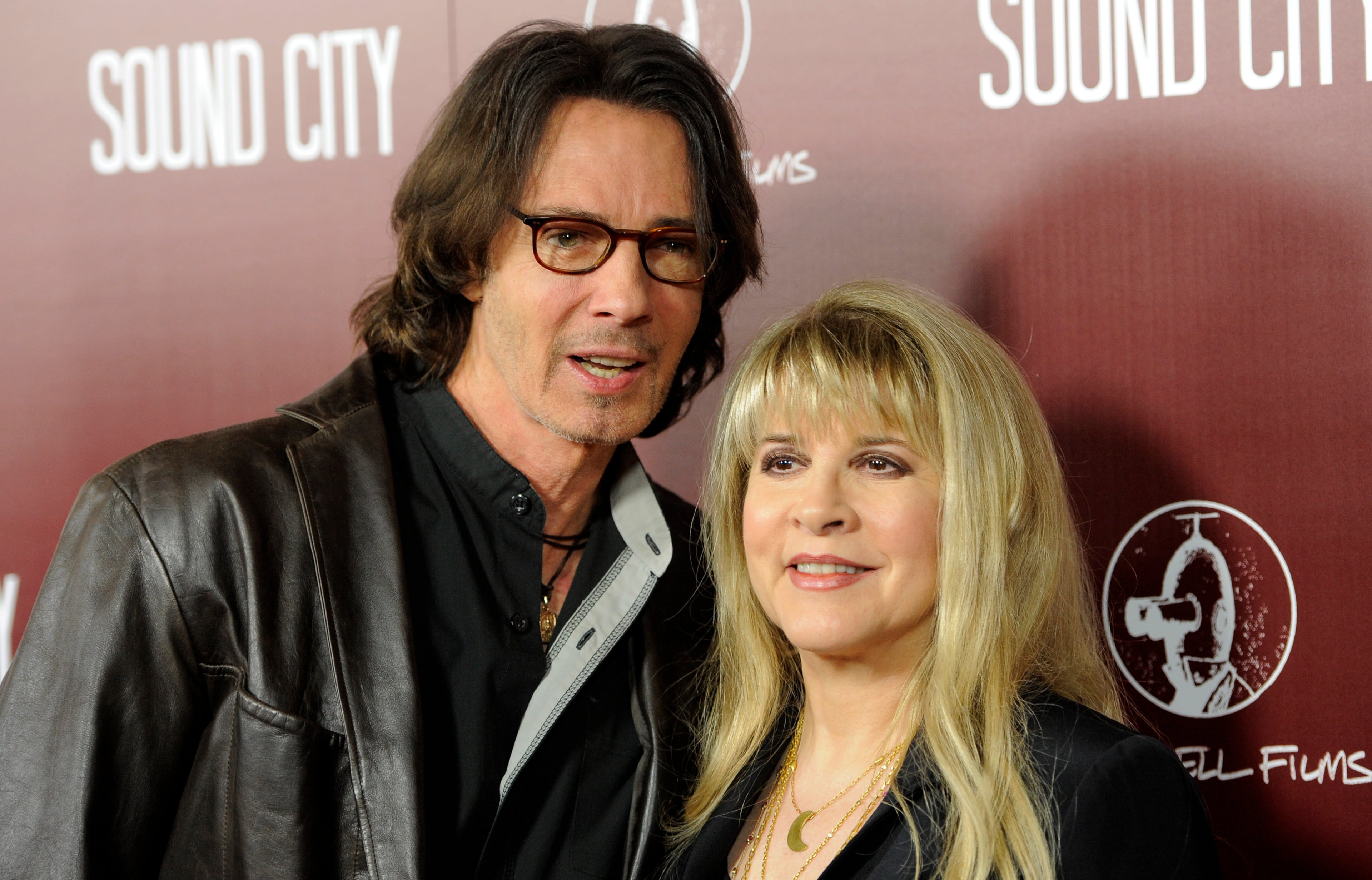 Singer Rick Springfield, left, and Stevie Nicks pose together at the premiere of the documentary film "Sound City" on Thursday, Jan. 31, 2013 in Los Angeles.
