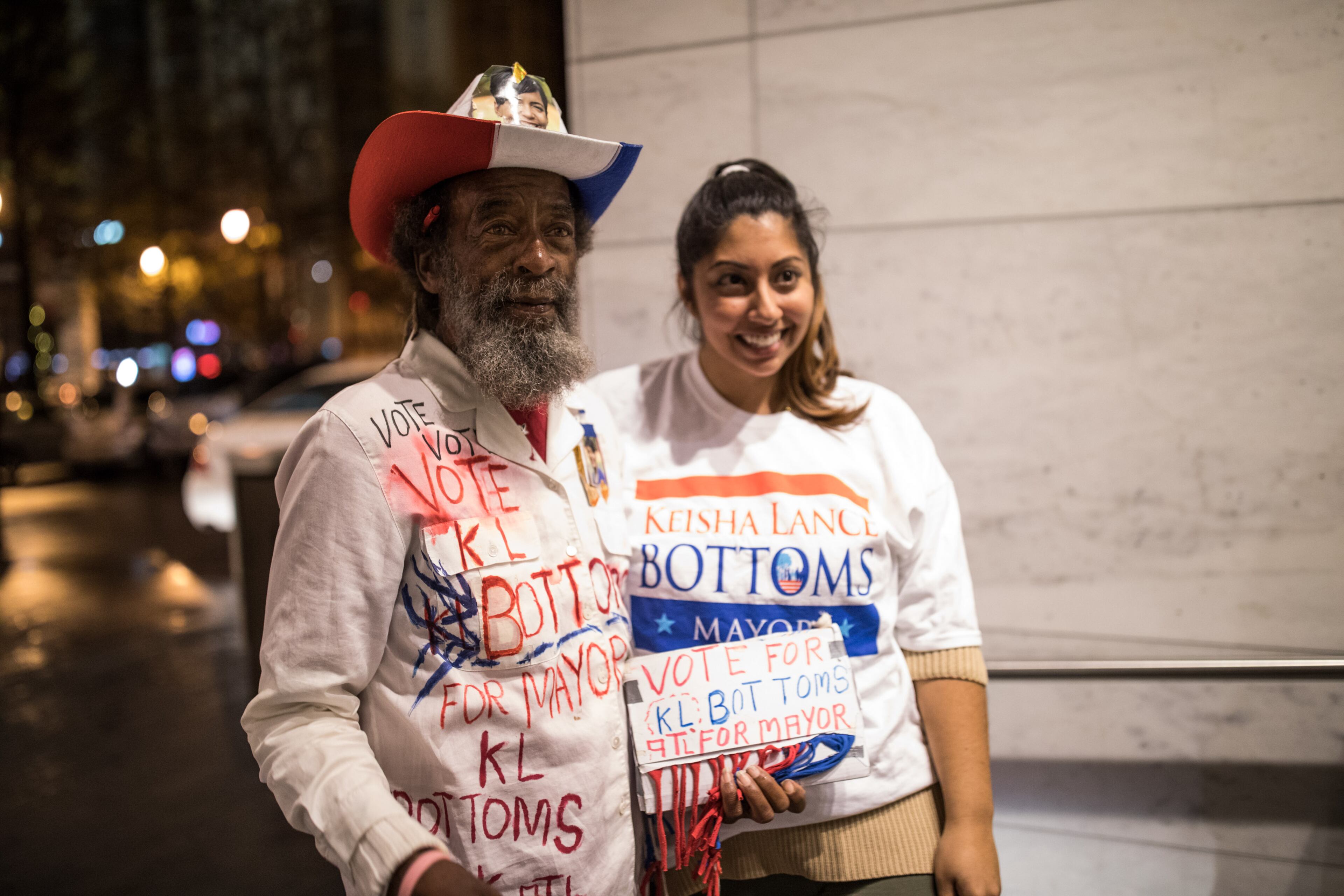 Charles Doyle, left, and Sarah Pirzad pose for photo before an election night party for Atlanta mayoral candidate Keisha Lance Bottoms, who is running against mayoral candidate Mary Norwood, at the Hyatt Regency Hotel, Tuesday, Dec. 5, 2017, in Atlanta. BRANDEN CAMP/SPECIAL