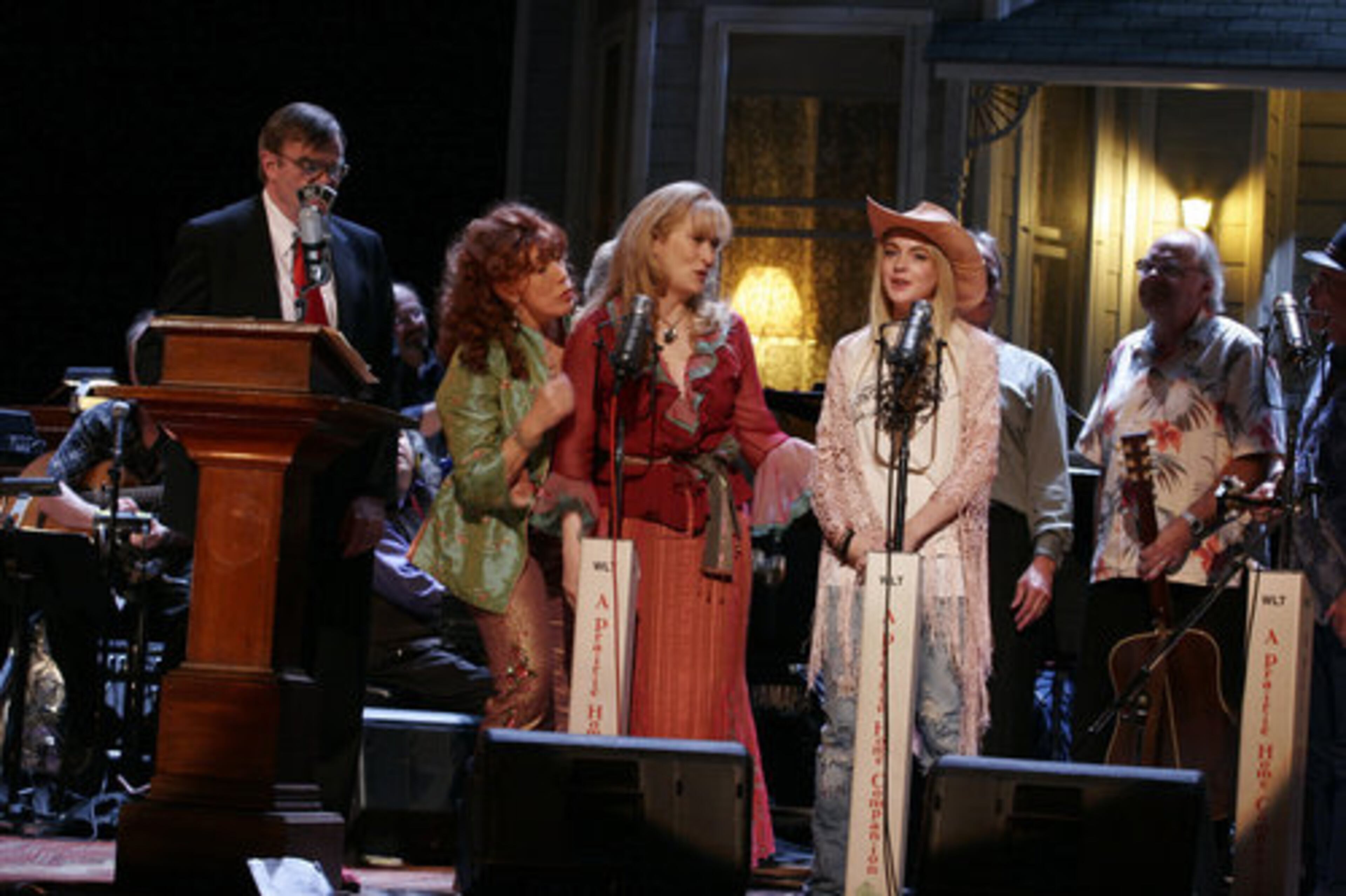 Garrison Keillor (from left), Lily Tomlin, Meryl Streep and Lindsay Lohan in "A Prairie Home Companion."