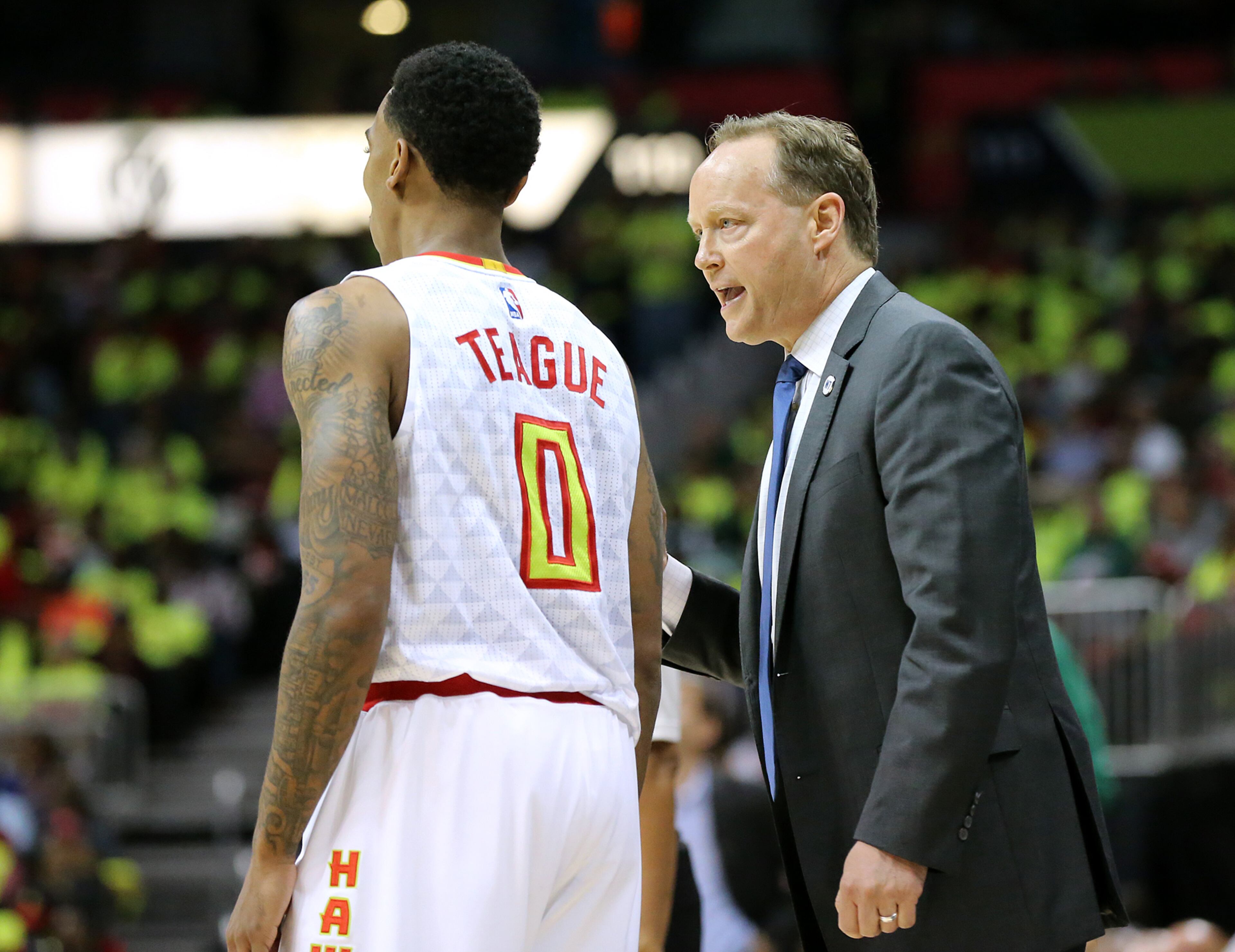 041616 ATLANTA: Mike Budenholzer coaches up Jeff Teague in game one of their NBA Eastern Conference first round playoff game against the Celtics at Philips Arena on Saturday, April 16, 2016. Curtis Compton / ccompton@ajc.com