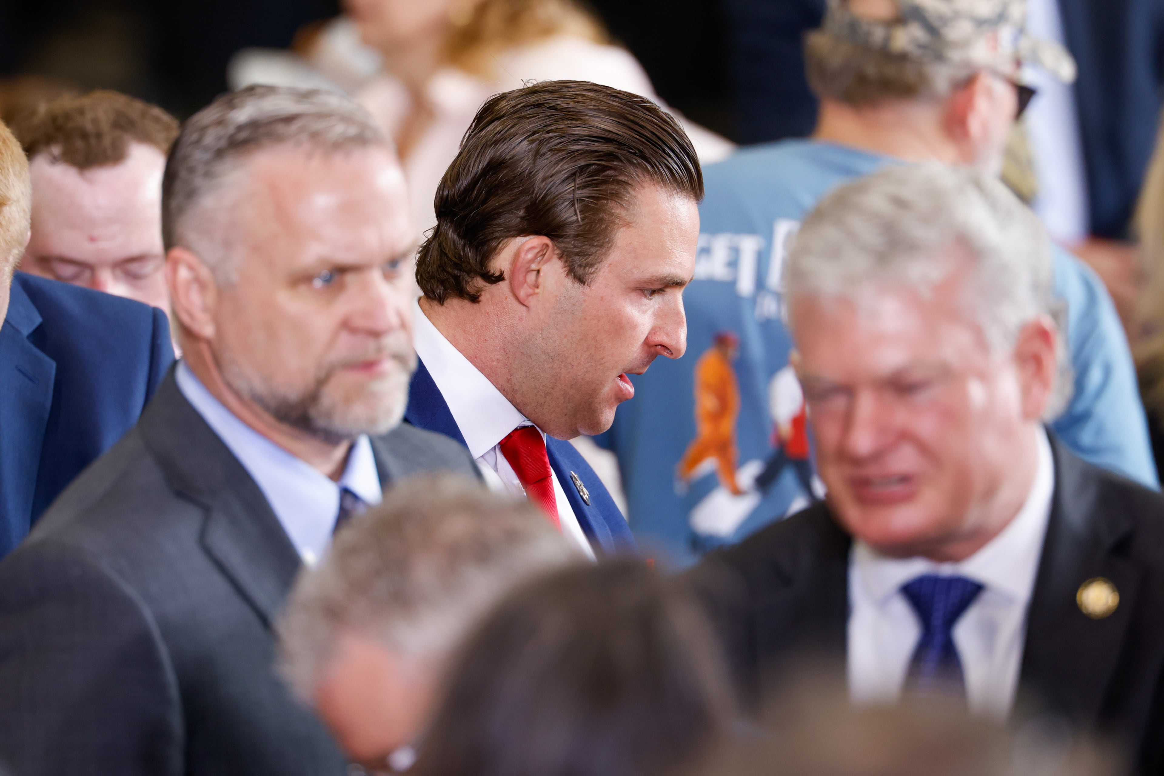 State Rep. David Clark (center), R-Buford, who is running for lieutenant governor, appears before President Donald Trump speaks at Coosa Steel service center in Rome on Thursday, Feb. 19, 2026. It was Trump’s first visit to Georgia since his reelection. (Arvin Temkar/AJC)
