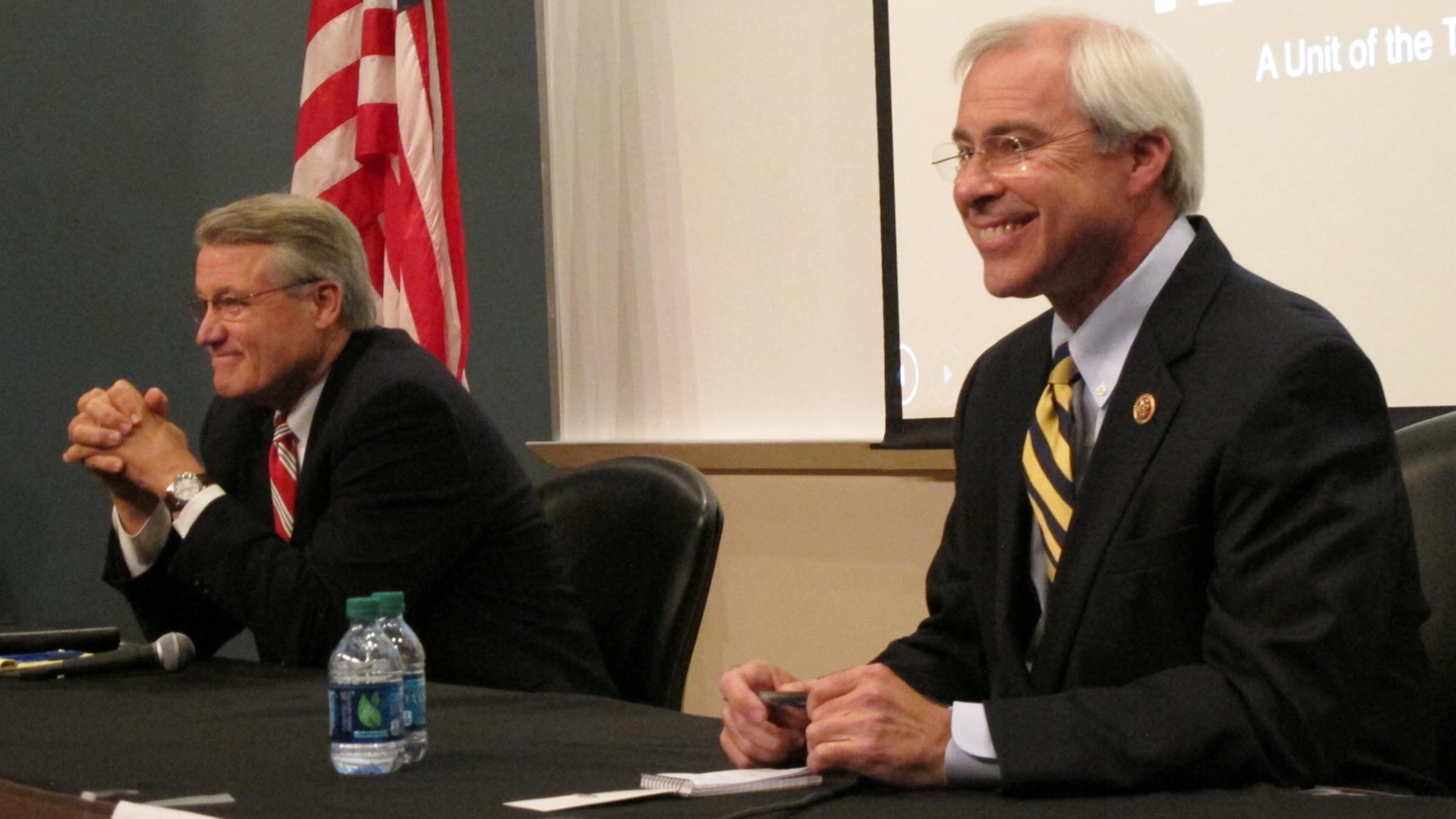 Republican Rick Allen, left, and Democratic U.S. Rep. John Barrow wait for their debate to begin Thursday, Oct. 16, 2014, at a college auditorium in Statesboro, Georgia. Barrow is a top target of the national Republican Party as he seeks a sixth term in Georgia's 12th District, a seat that was redrawn to favor a GOP candidate. (AP Photo/Russ Bynum) Republican Rick Allen, left, and Democratic U.S. Rep. John Barrow wait for their debate to begin Thursday, Oct. 16, 2014, at a college auditorium in Statesboro, Georgia. Barrow is a top target of the national Republican Party as he seeks a sixth term in Georgia's 12th District, a seat that was redrawn to favor a GOP candidate. (AP Photo/Russ Bynum)