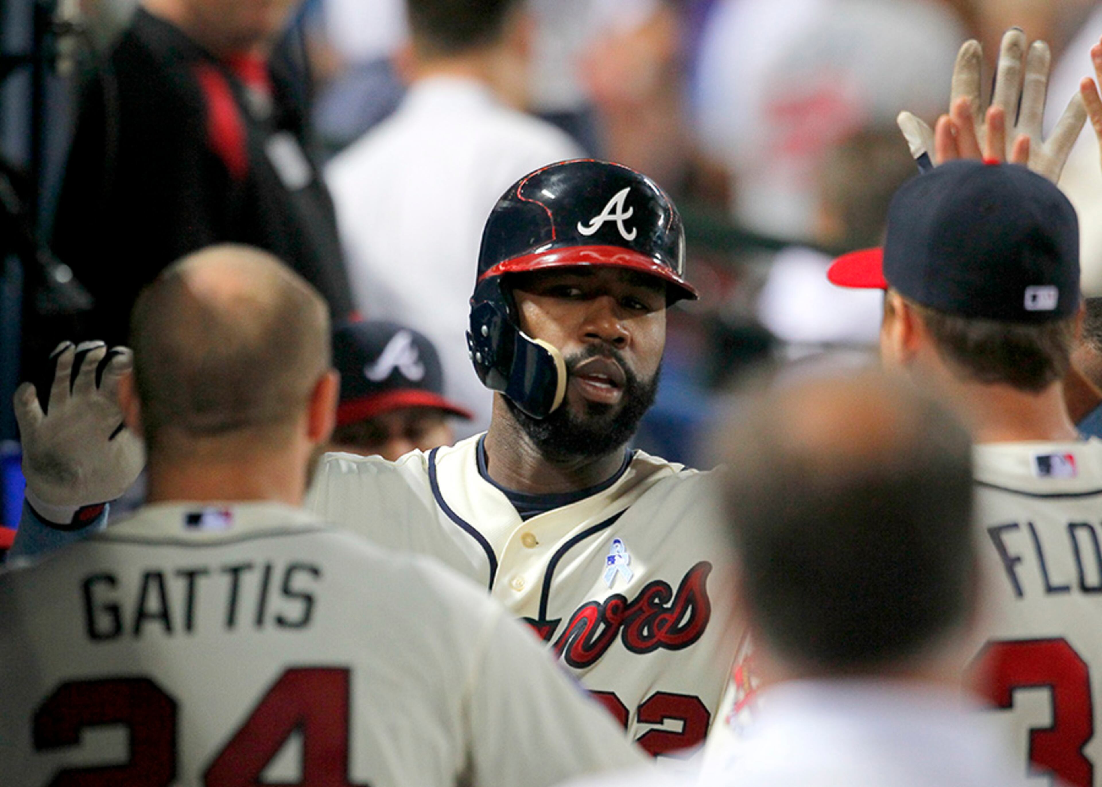 Atlanta Braves outfielder Jason Heyward (22) celebrates his home run with teammates in the seventh inning Sunday at Turner Field.