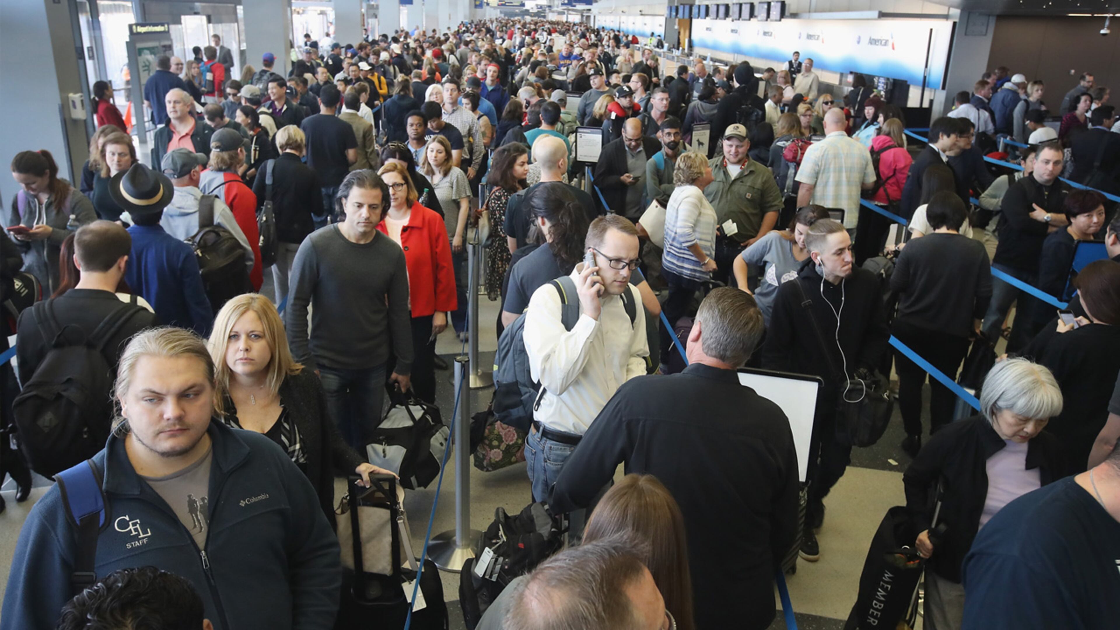 Passengers at O'Hare International Airport wait in line to be screened at a Transportation Security Administration (TSA) checkpoint on May 16, 2016 in Chicago, Illinois. Waiting times at the checkpoints today have been reported to be as long 2 hours. The long lines have been blamed for flight delays and a large number of passengers missing flights completely. (Photo by Scott Olson/Getty Images)