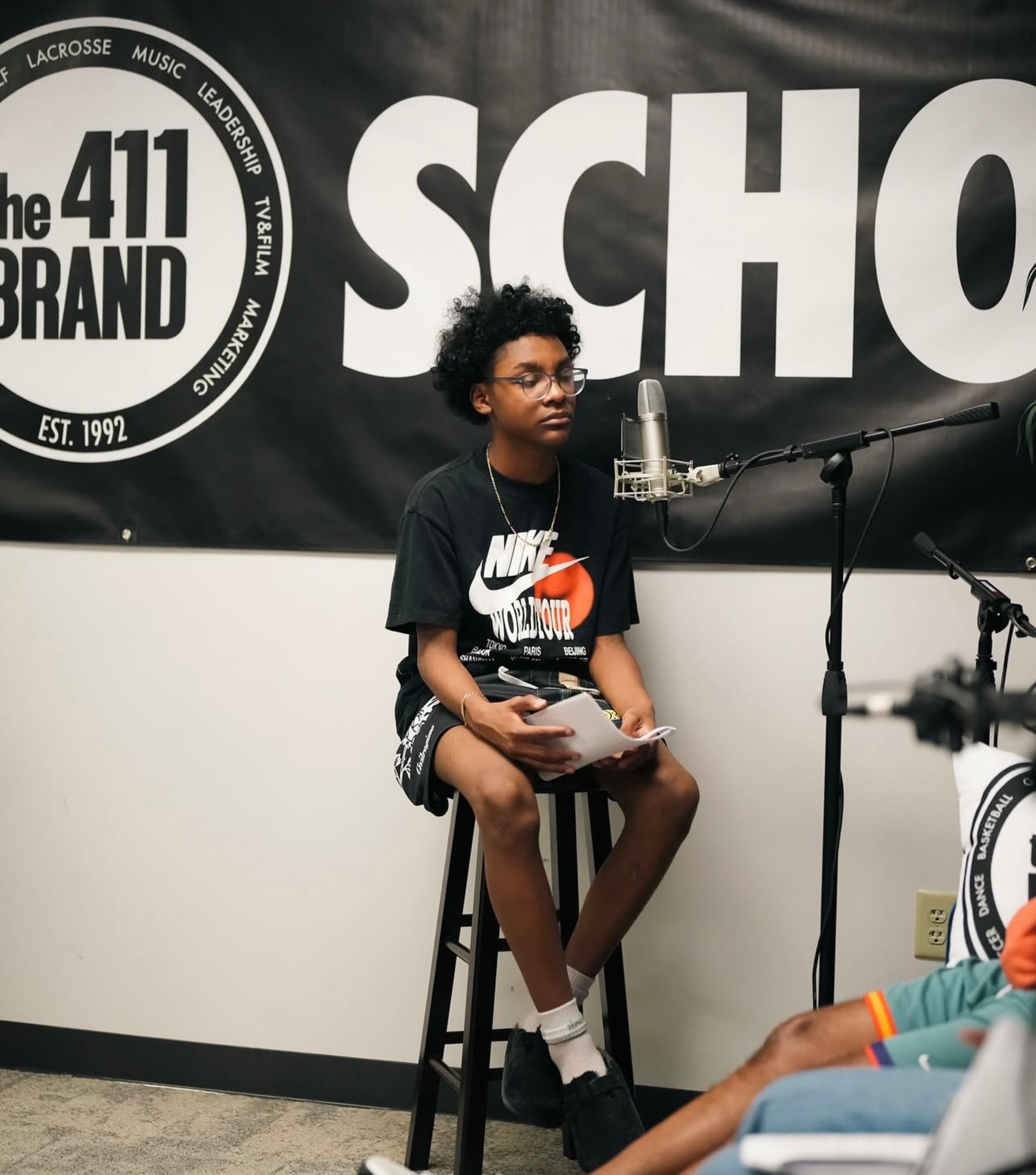 Students in the mass media program learn branding, storytelling and creating visuals. They also learned about podcasting by starting a podcast business. (Courtesy of The 411 Brand)