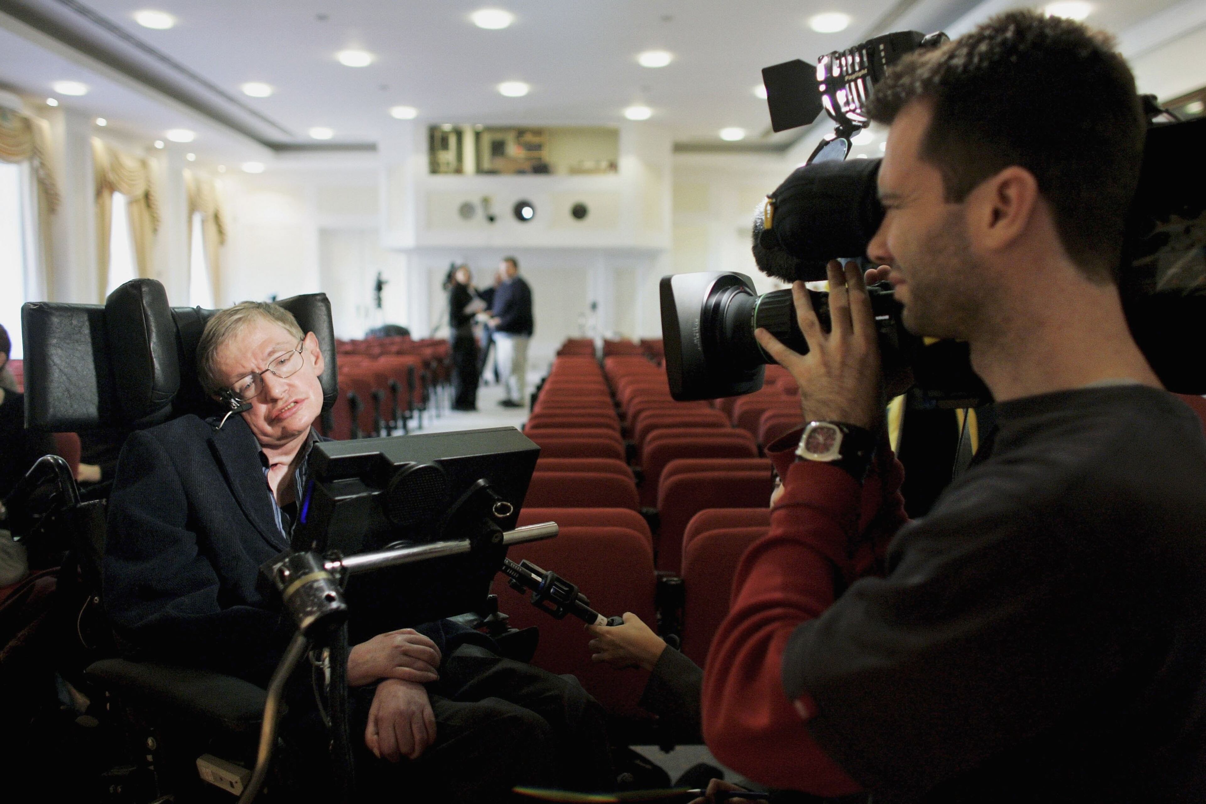 LONDON - JANUARY 17: Professor, Stephen Hawking delivers his speech at the release of the Bulletin of the Atomic Scientists on January 17, 2007 in London, England. A group of scientists assessing the dangers posed to civilisation have moved the Doomsday Clock forward two minutes closer to midnight as an indication and warning of the threats of nuclear war and now also climate change. (Photo by Bruno Vincent/Getty Images)