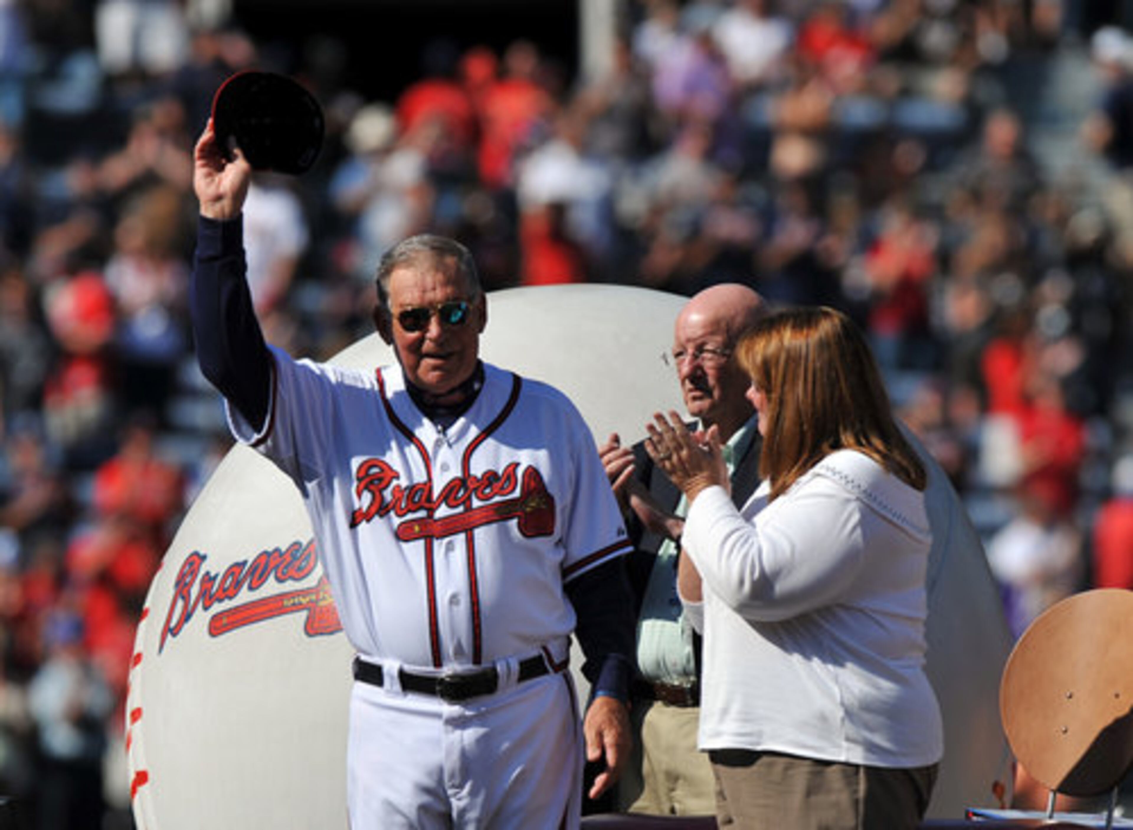 Braves' retiring manager Bobby Cox acknowledges the crowd as his wife, Pam, looks on. Saturday, Oct. 2, 2010. Photos by Brant Sanderlin.