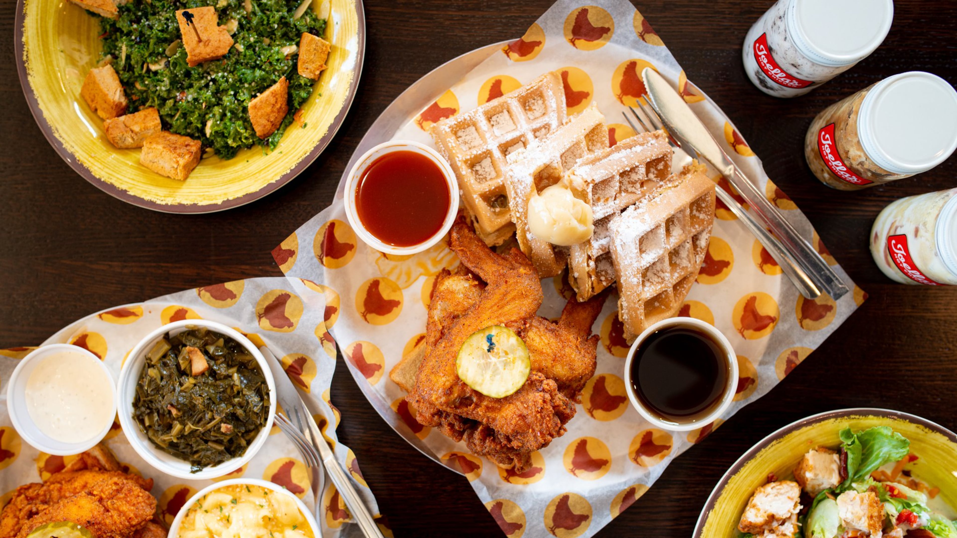 Joella's Hot Chicken Chicken and Waffles, Jumbo Tenders, Kale Crunch salad, Wedge salad, and Pie-In-A-Jar. Photo credit- Mia Yakel.