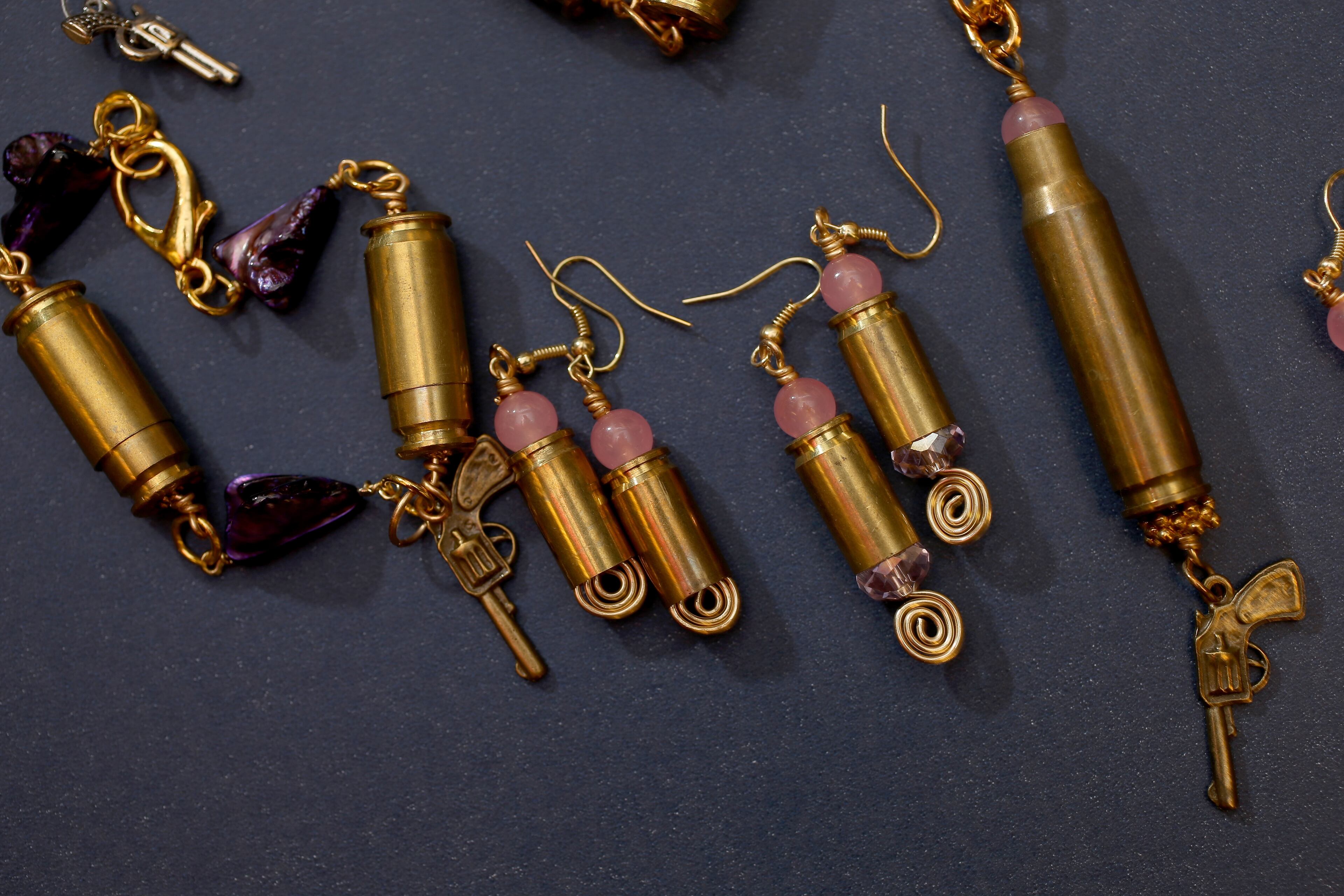 Some of the bracelets, earrings and necklaces available from Gun Girls Inc.