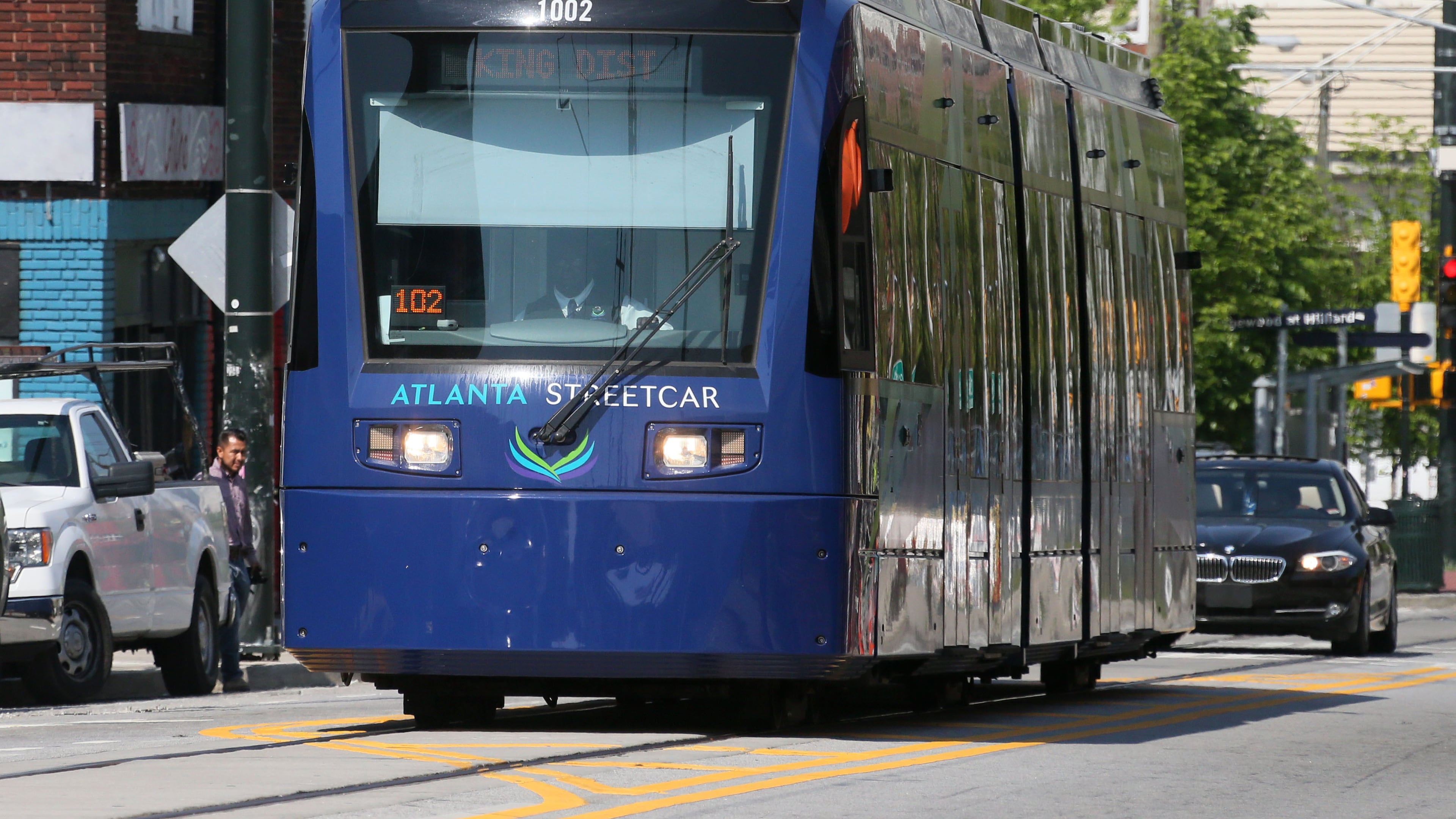 The Streetcar makes its way up Edgewood Ave in April. The service remained shutdown Friday as work continued on a sinkhole in the eastbound lane of Edgewood between Jesse Hill Drive and Bell Street.