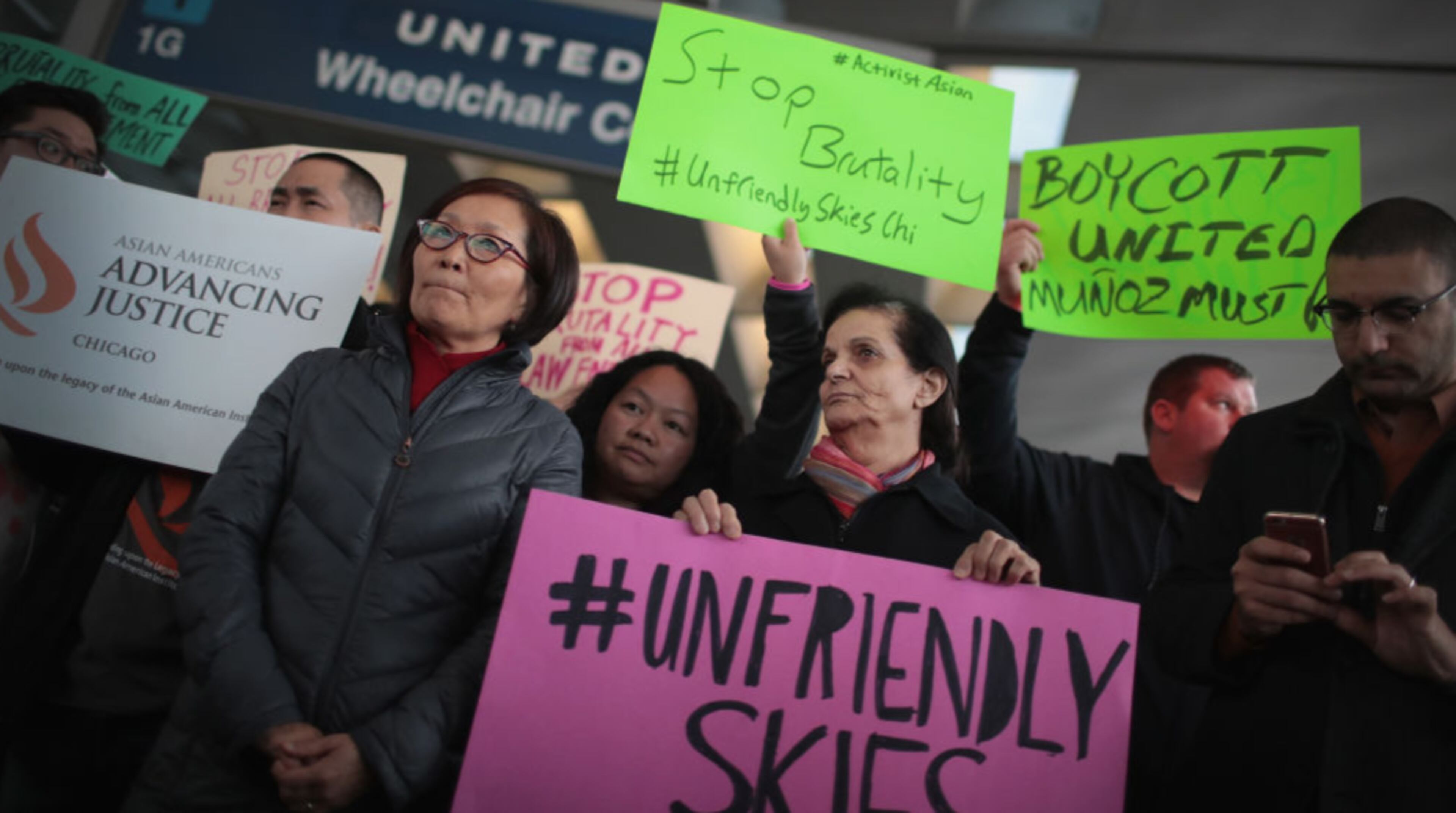 CHICAGO, IL - APRIL 11: Demonstrators protest outside the United Airlines terminal at O'Hare International Airport on April 11, 2017 in Chicago, Illinois. United Airlines has been struggling to restore their corporate image after a cell phone video was released showing a passenger being dragged from his seat and bloodied by airport police after he refused to leave a reportedly overbooked flight. (Photo by Scott Olson/Getty Images)