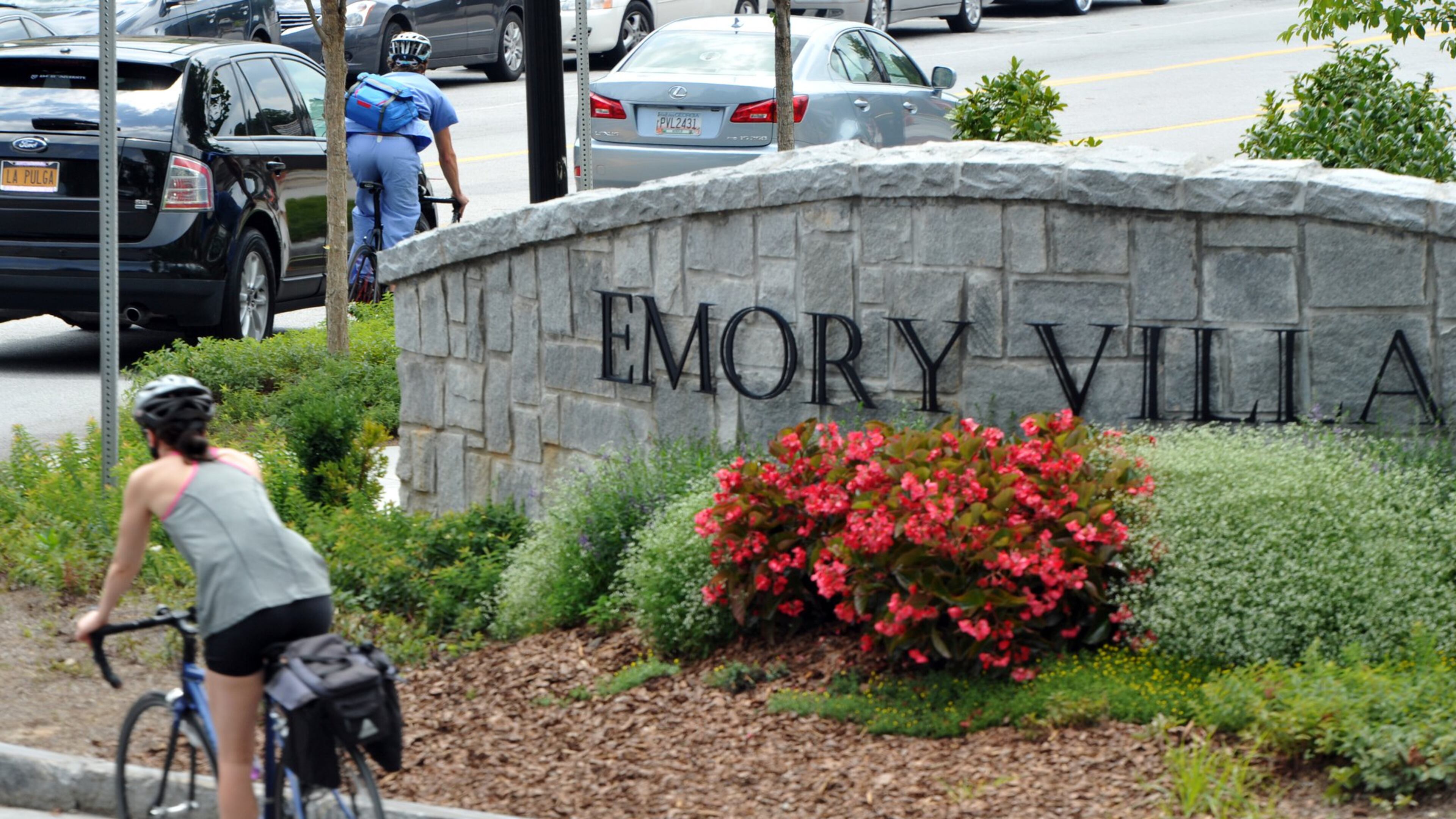 A traffic circle, and shops and restaurants in Emory Village near an entrance to Emory University in Atlanta on Thursday, July 31, 2014. HYOSUB SHIN / HSHIN@AJC.COM