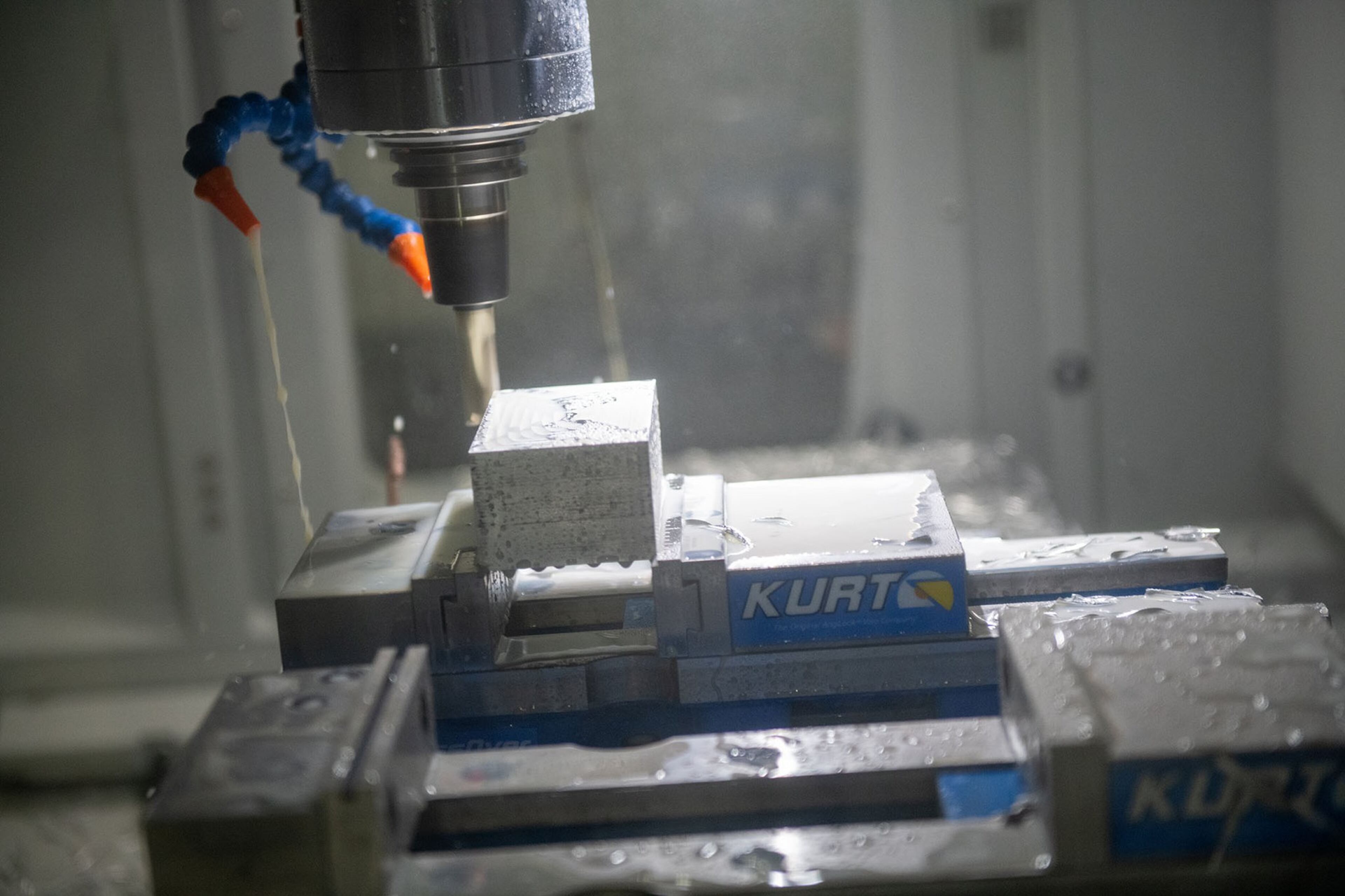 Inside a machine making test cuts at Plethora, which makes custom prototypes, in Marietta in December. PHOTO BY ELISSA BENZIE