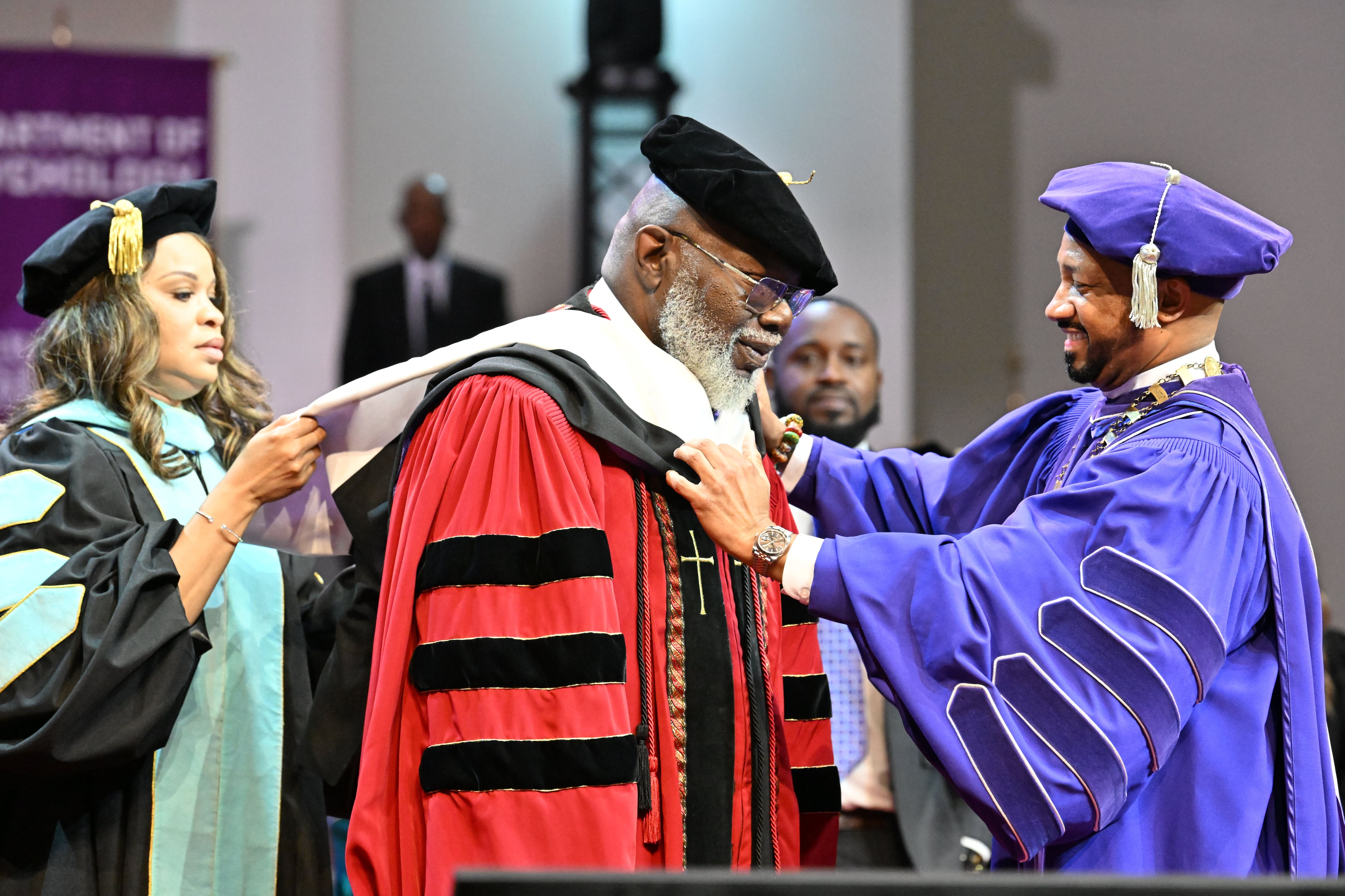 Commencement speaker Bishop T.D. Jakes receives an honorary doctorate degree from Morris Brown College president Kevin James during 2025 Morris Brown College commencement exercises at Saint Philip A.M.E. Church, Saturday, May 17, 2025, in Atlanta. (Hyosub Shin / AJC)