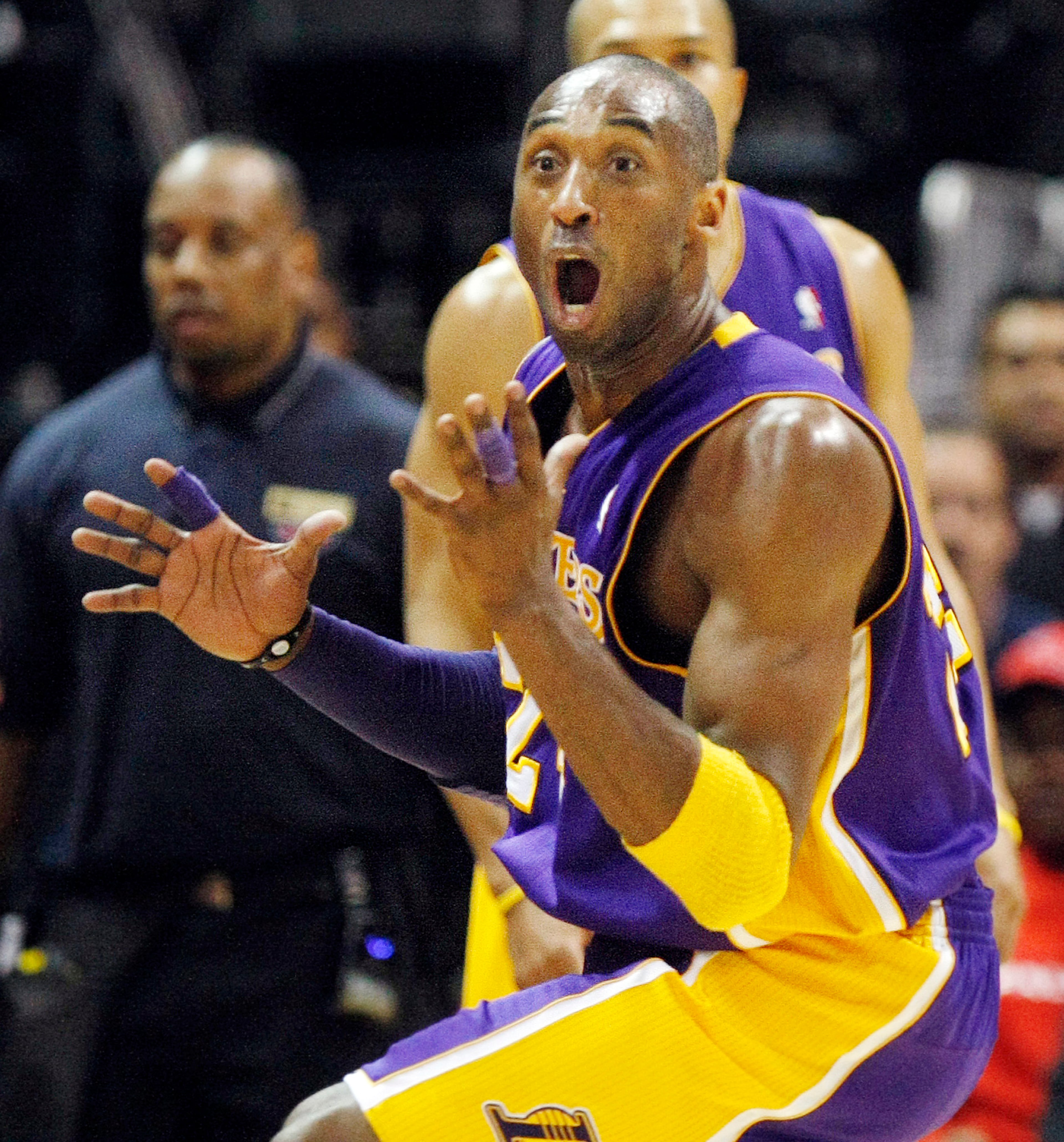 Kobe Bryant reacts to a foul call during the 2011 game. (AJC file photo/Curtis Compton)
