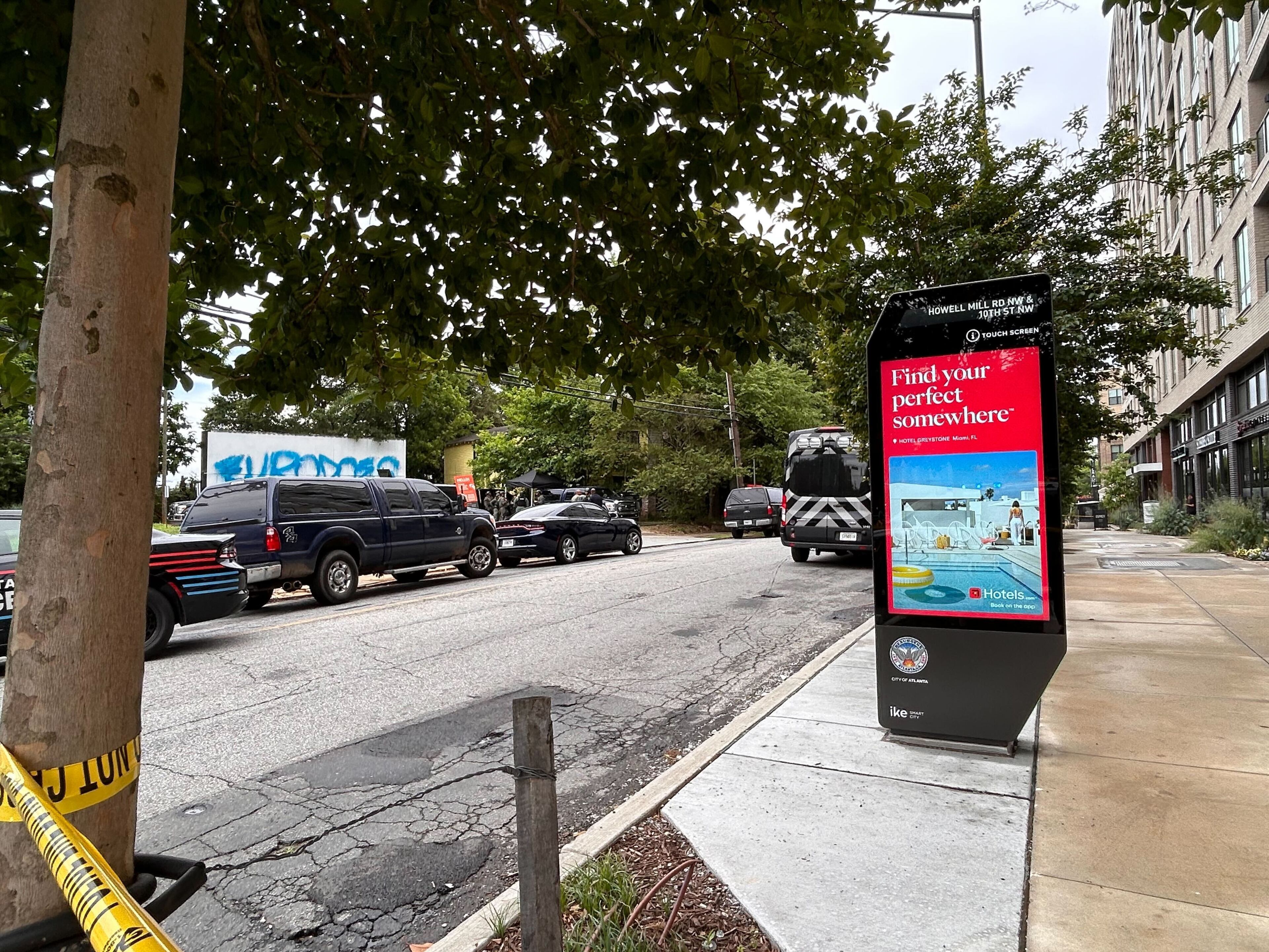 Atlanta police search for a shooting suspect in the area of the Brady apartments in West Midtown.