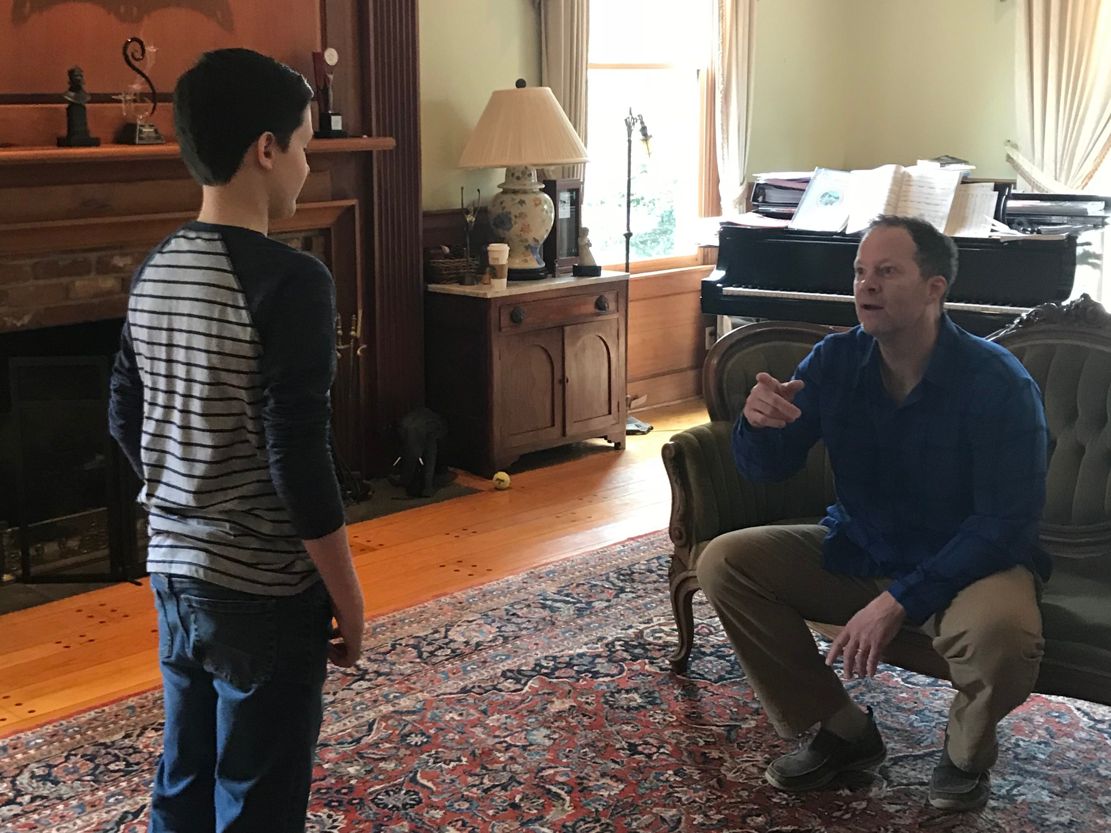 Shuler Hensley (right), Tony Award-winning actor and associate artistic director of the City Springs Theatre company, works with student
Lukas DeLancey.