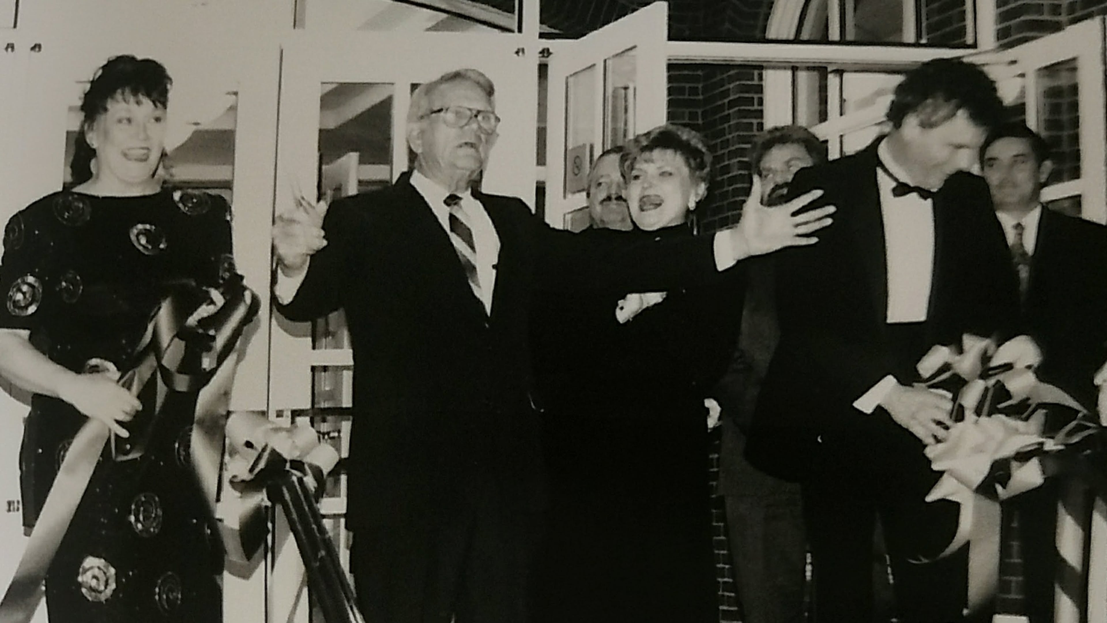 From left: Anita Farley (Georgia Ensemble co-founder and managing director), former Roswell Mayor William Lee "Pug" Mabry and Robert Farley (Georgia Ensemble co-founder and artistic director) attend the ribbon cutting ceremony for Georgia Ensemble Theatre in 1992 at the Roswell Cultural Arts Center. (Courtesy of Laurel Farley Crowe)