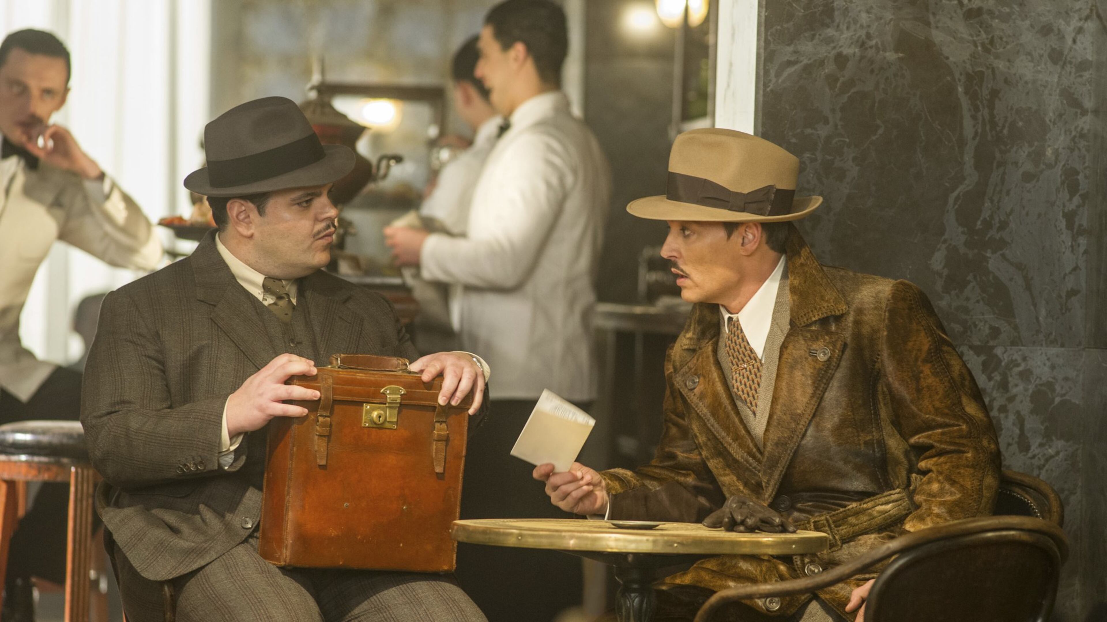 Josh Gad, left, and Johnny Depp star in “Murder on the Orient Express.” Contributed by Nicola Dove/Twentieth Century Fox via AP