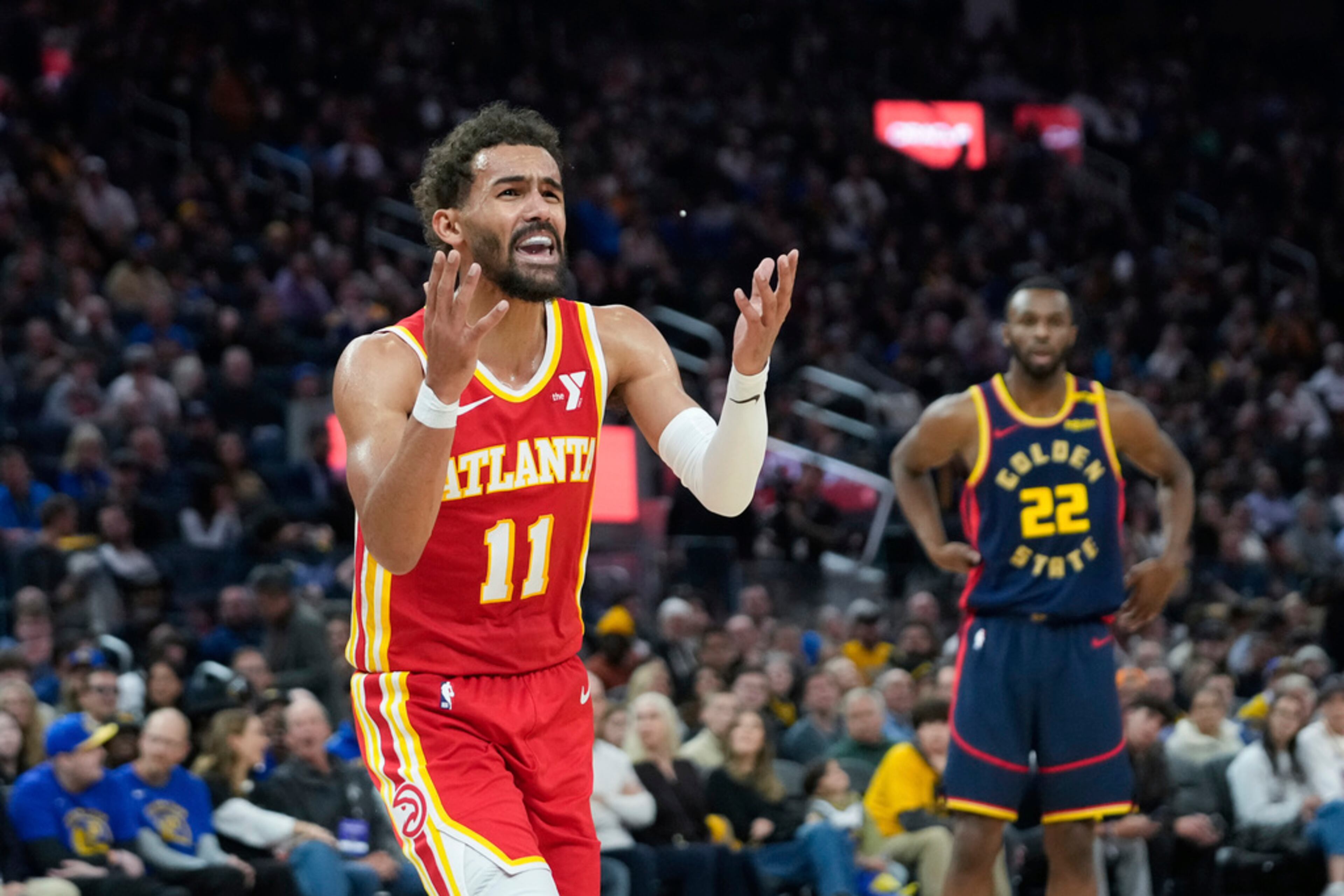 Atlanta Hawks guard Trae Young reacts during the first half of an NBA basketball game against the Golden State Warriors, Wednesday, Nov. 20, 2024, in San Francisco. Golden State won 120-97. (AP Photo/Godofredo A. Vásquez)