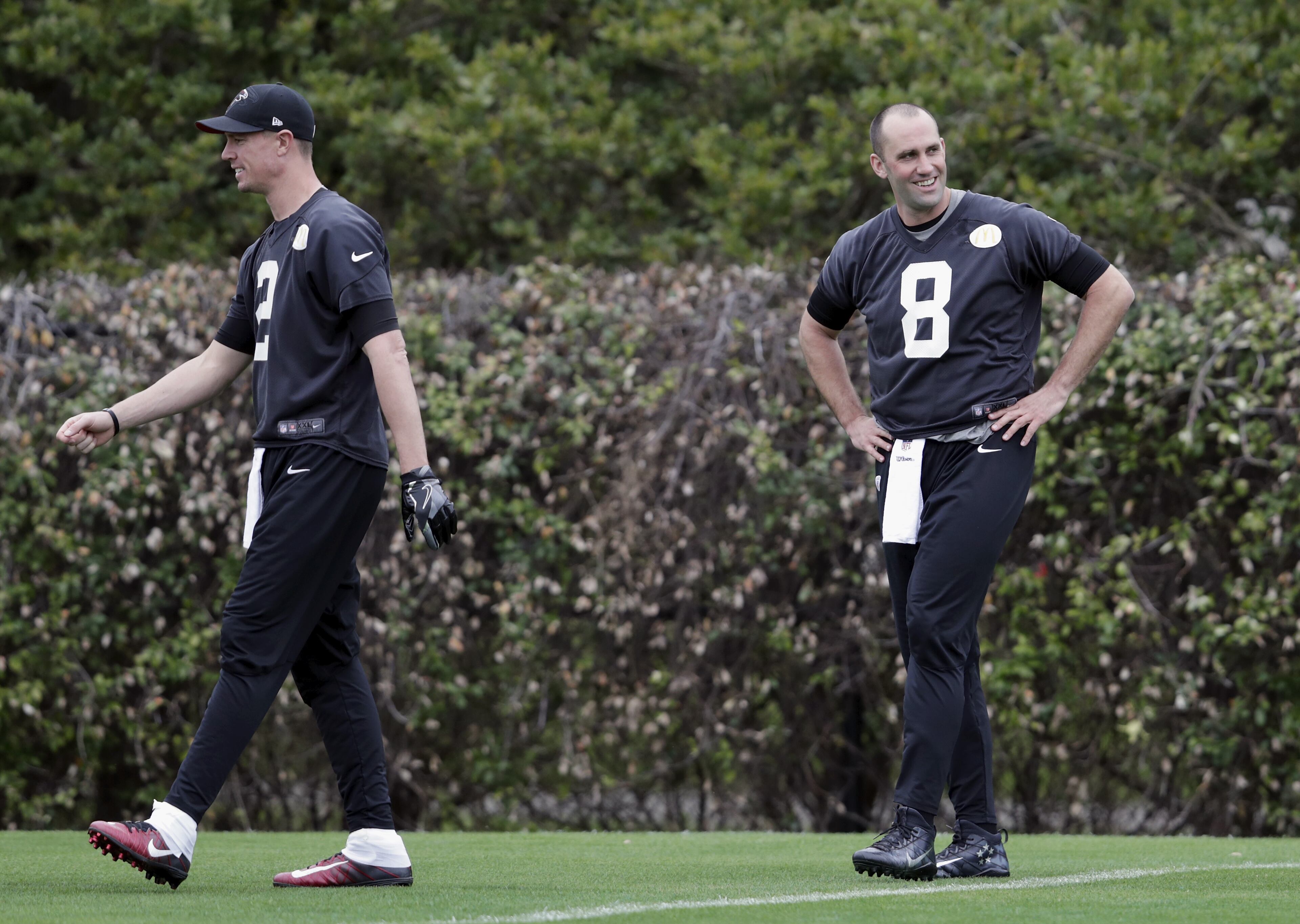 HOUSTON, TX - FEBRUARY 03: Matt Schaub #8 of the Atlanta Falcons and Matt Ryan #2 walk onto the field during the Super Bowl LI practice on February 3, 2017 in Houston, Texas. (Photo by Tim Warner/Getty Images)