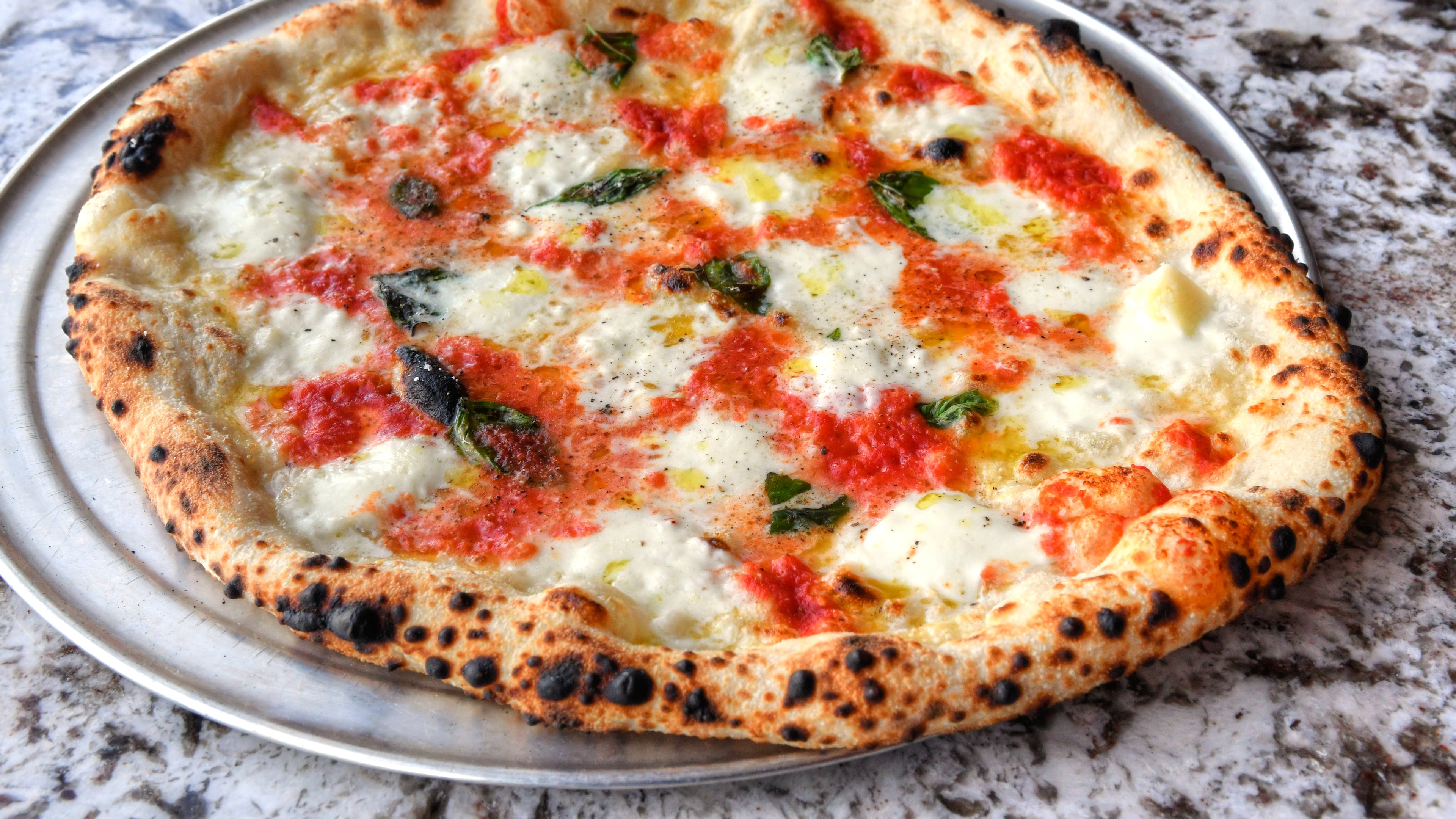 The Margherita pizza continues to set a high standard at Varasano's. Chris Hunt for The Atlanta Journal-Constitution