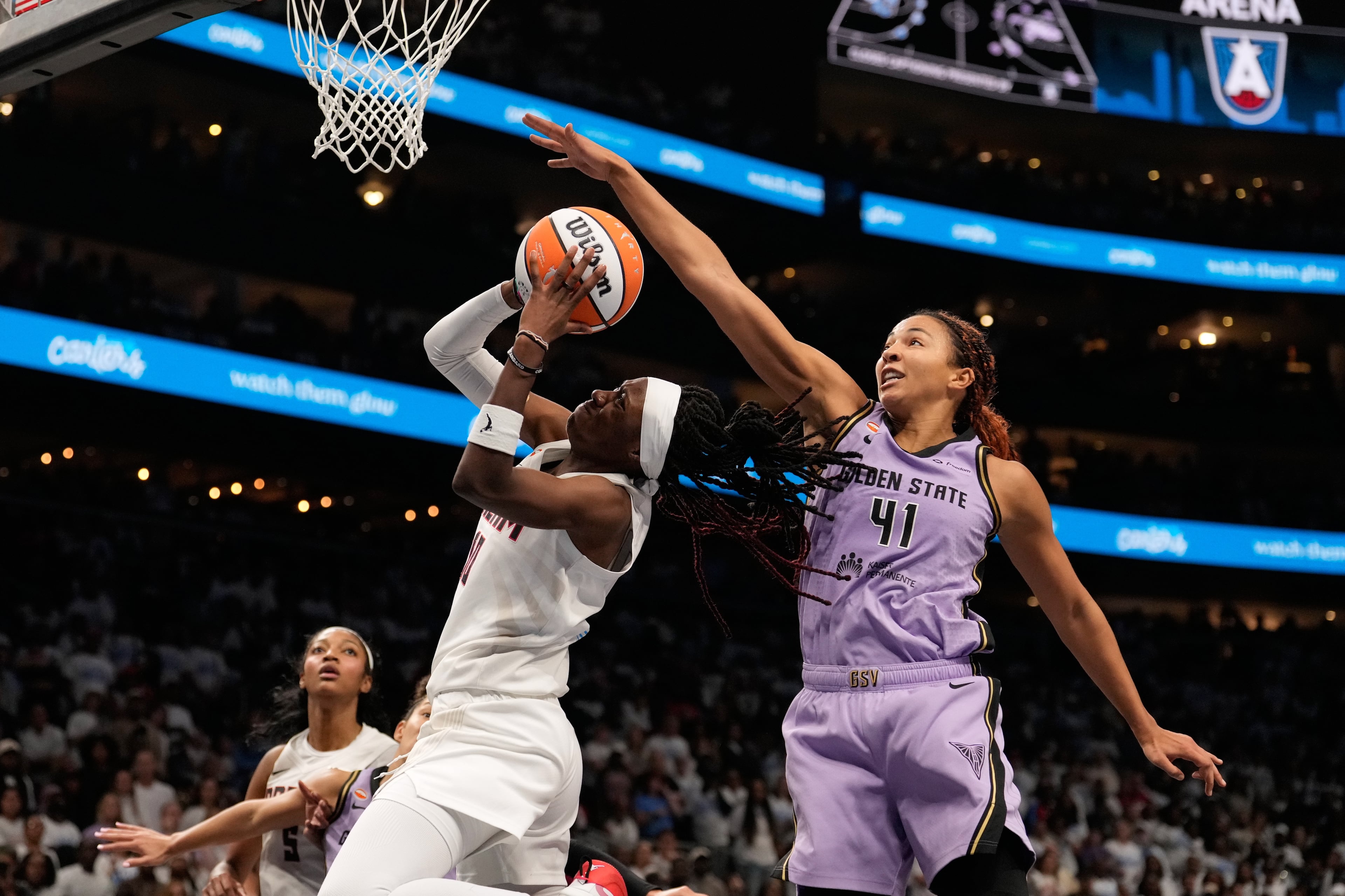 Atlanta Dream guard Rhyne Howard (10) attempts to shoot against Golden State Valkyries center Kiah Stokes (41) in the second half during Game 4 of the WNBA basketball finals on Saturday, Oct. 24, 2026, in Atlanta. (AP Photo/Brynn Anderson)