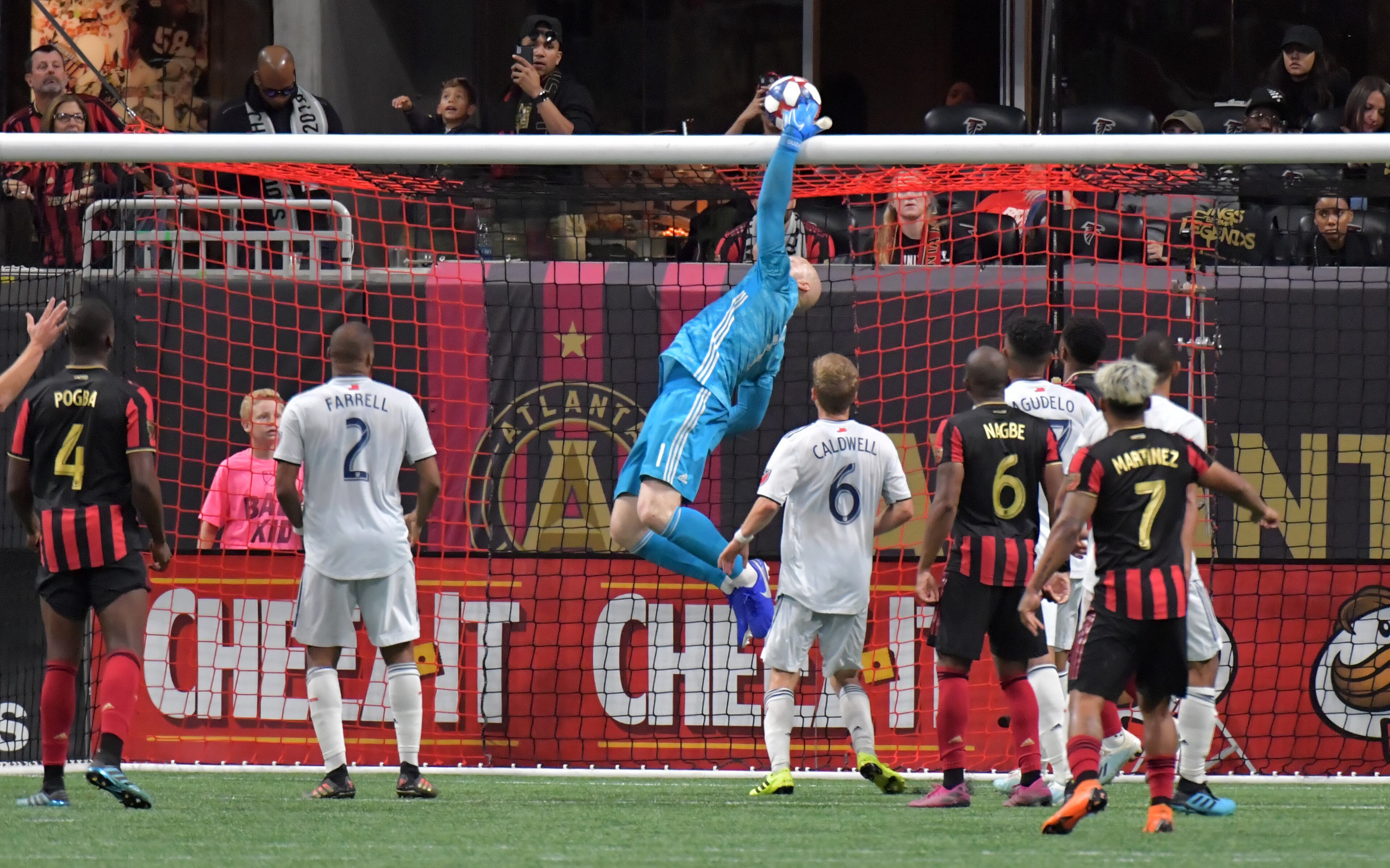Atlanta United goalkeeper Brad Guzan (1) blocks the shot at the end of the second half during the first round of the MLS playoffs at Mercedes-Benz Stadium on Saturday, October 19, 2019. Atlanta United won 1-0 over the New England Revolution. (Hyosub Shin / Hyosub.Shin@ajc.com)