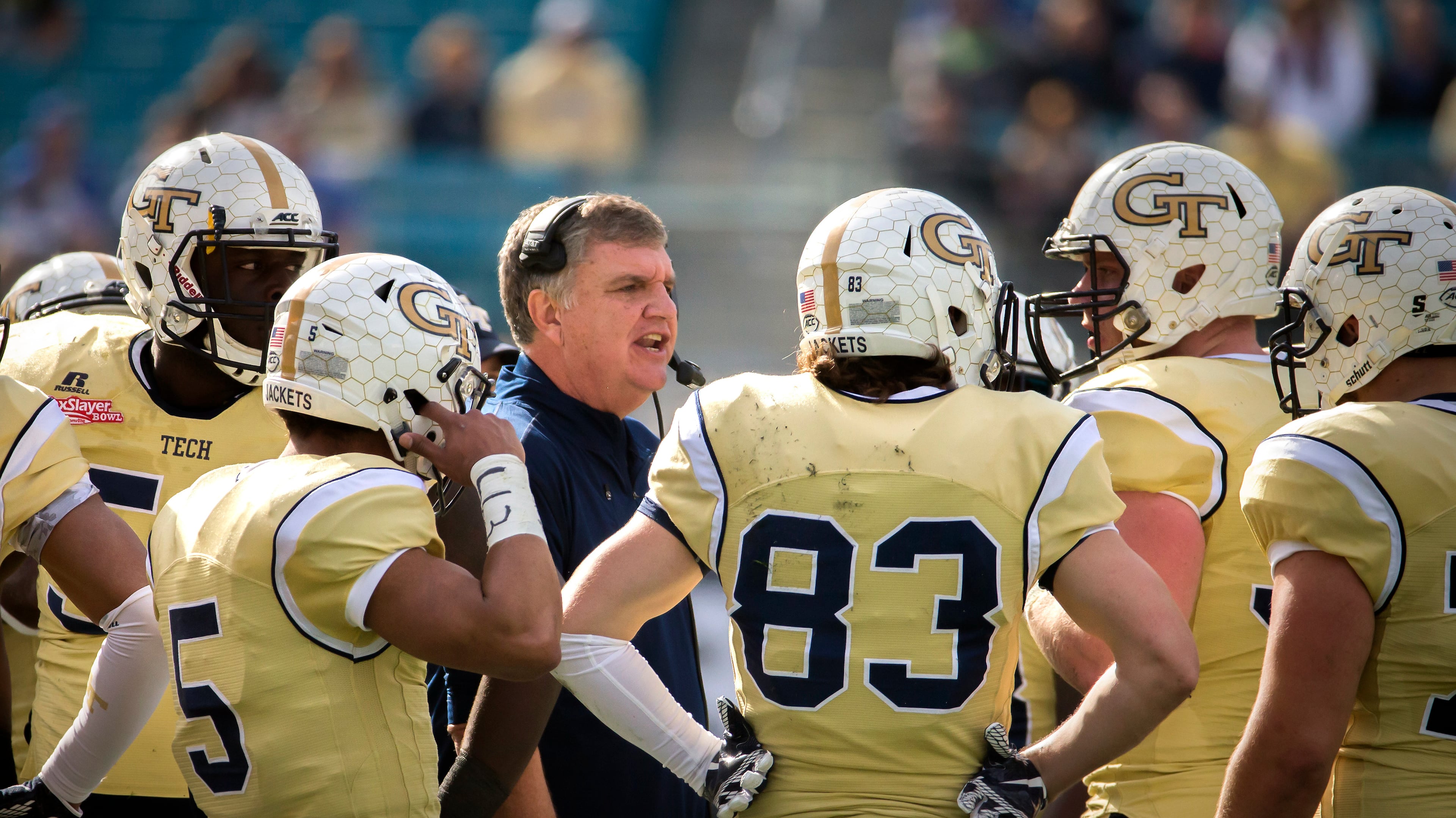 Georgia Tech head coach Paul Johnson talks to his players during the first half of the TaxSlayer Bowl NCAA college football game against Kentucky, Saturday, Dec. 31, 2016, in Jacksonville, Fla. (AP Photo/Stephen B. Morton)