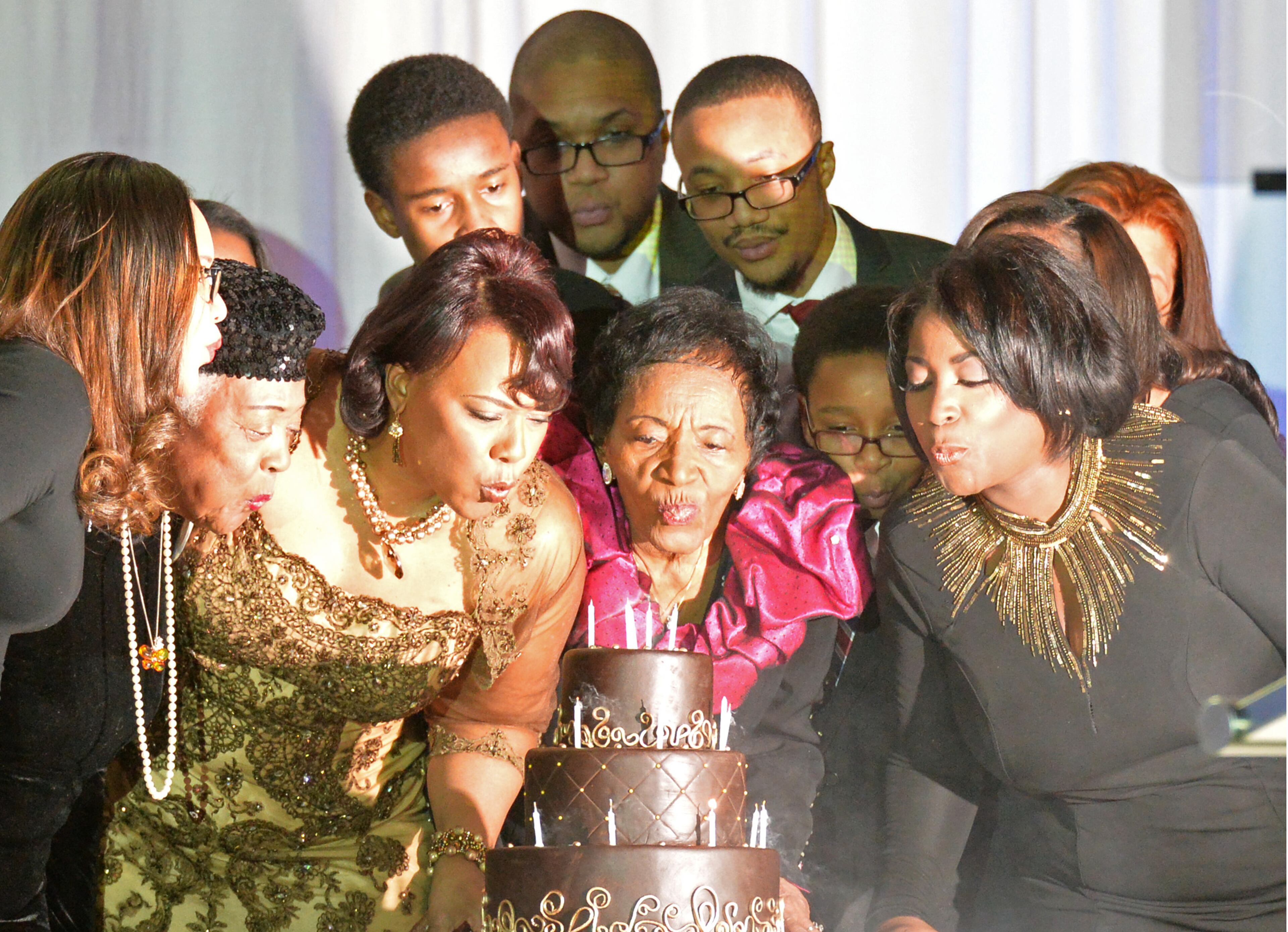 January 17, 2015 Atlanta - Martin Luther King Jr.'s daughter Bernice King (center left) and King's sister Christine King Farris (center right) lead members of the extended King family in a birthday celebration for Martin Luther King Jr. during the annual Salute to Greatness Awards Dinner at the Hyatt Regency on Saturday, January 17, 2015. HYOSUB SHIN / HSHIN@AJC.COM