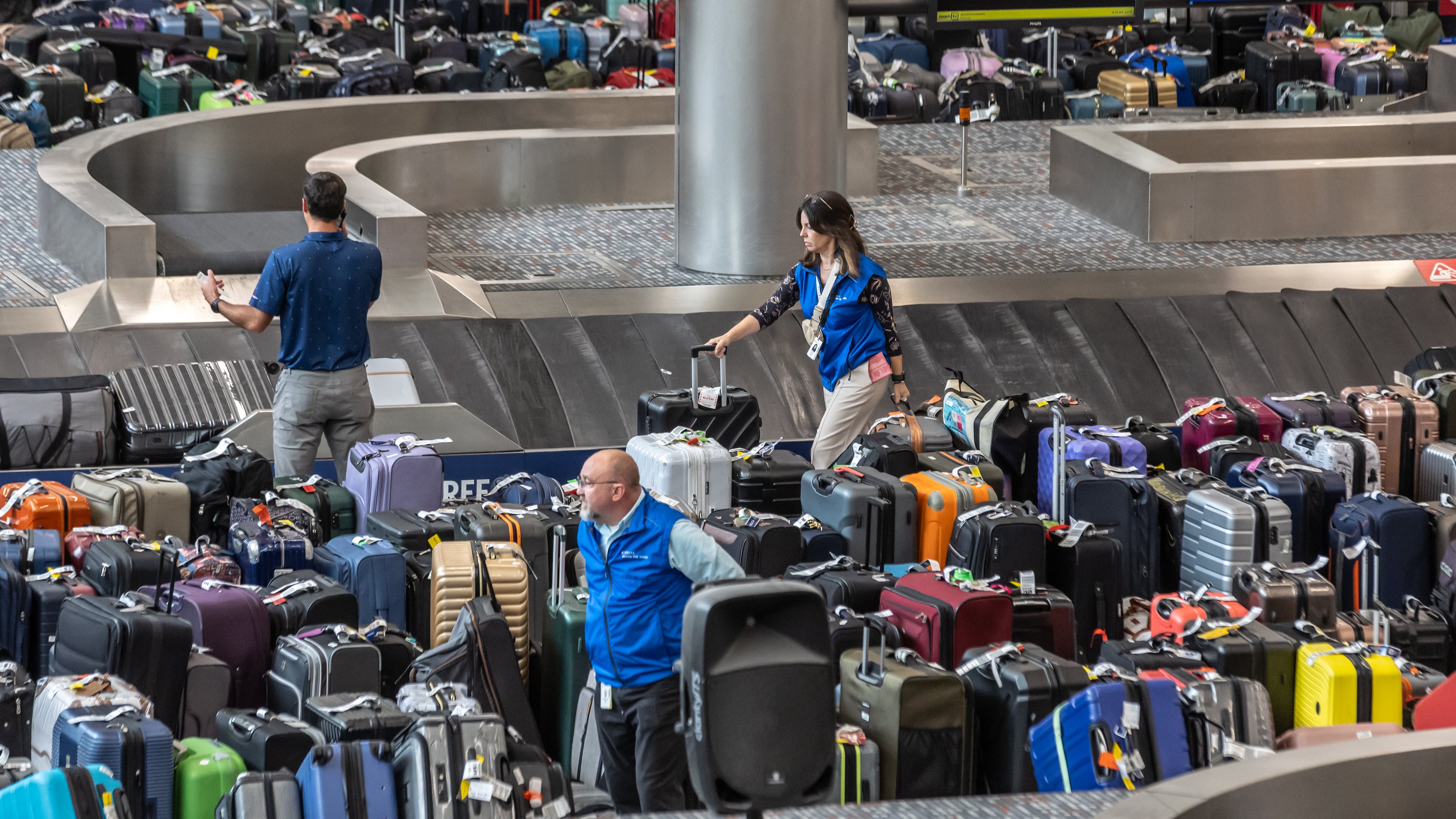 The South terminal baggage area at Hartsfield-Jackson Atlanta International Airport was filled with unclaimed bags last year after a computer shutdown stranded thousands of passengers. (John Spink/AJC 2024)