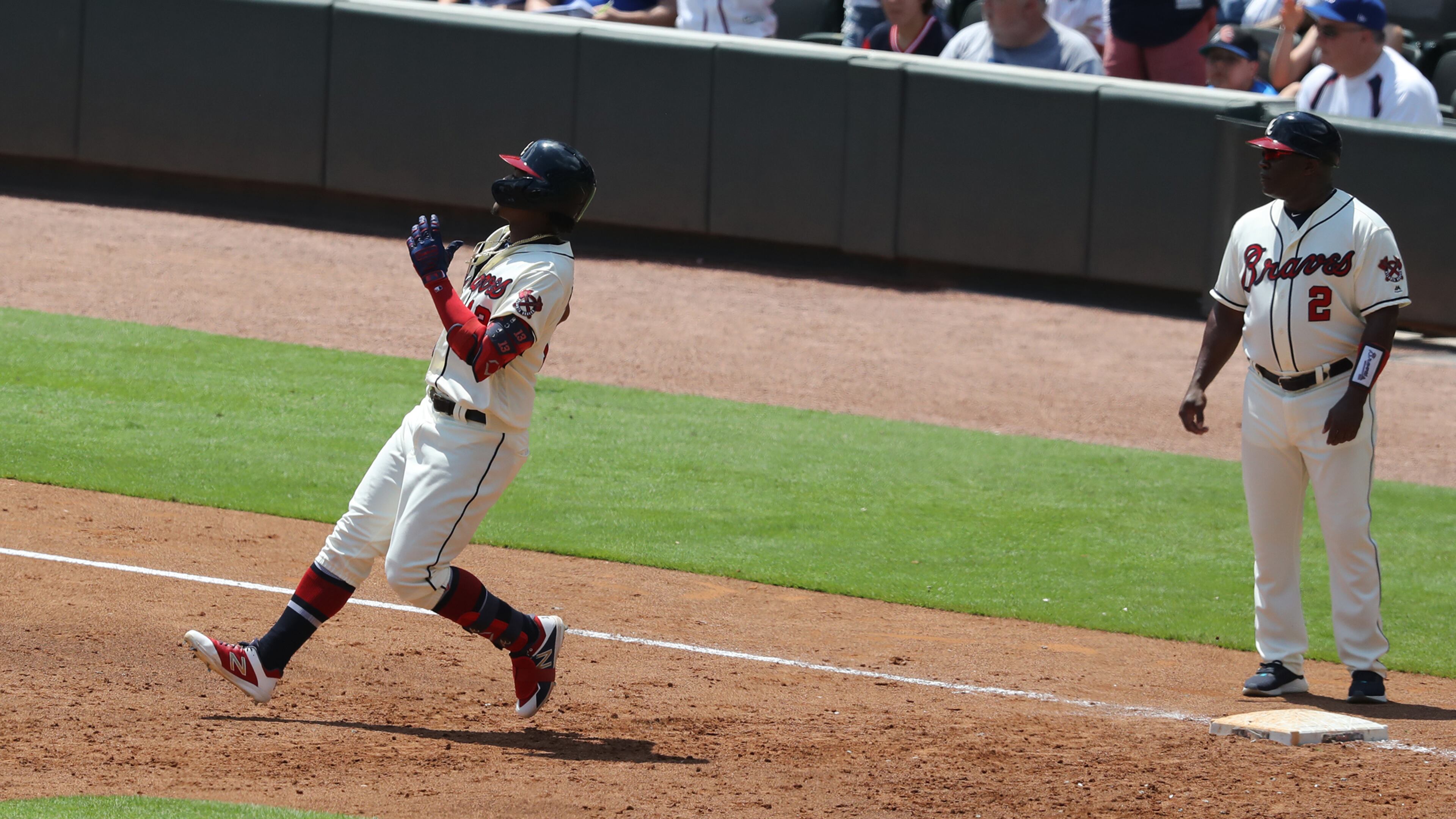 Braves outfielder Ronald Acuna pulls up at first base after just missing a home run against the Los Angeles Dodgers in the third inning Sunday, Aug. 18, 2019, at SunTrust Park in Atlanta.