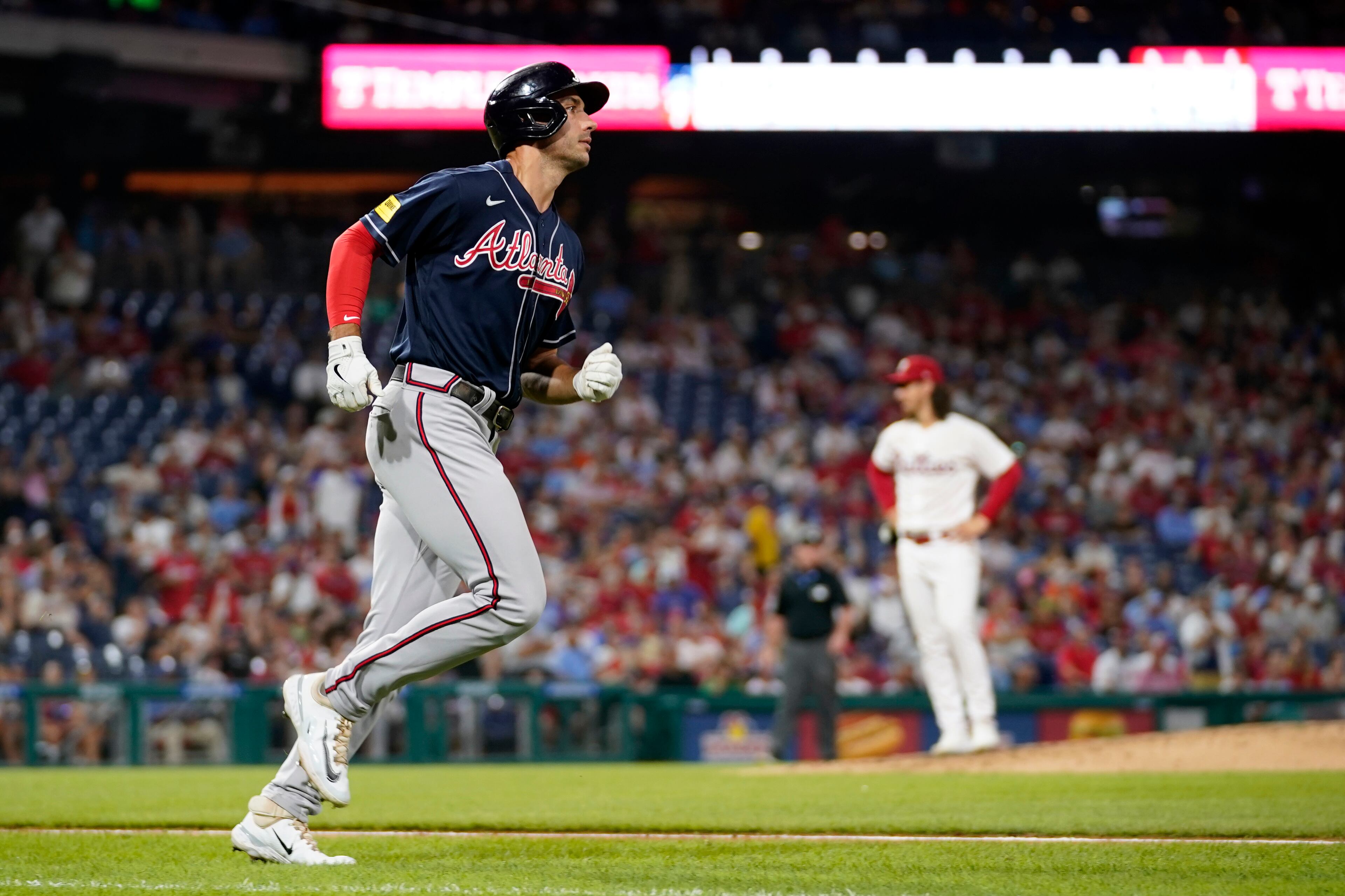 Matt Olson rounds the bases after hitting a three-run home run against Phillies pitcher Michael Lorenzen during the third inning of Monday's game in Philadelphia. (AP Photo/Matt Slocum)