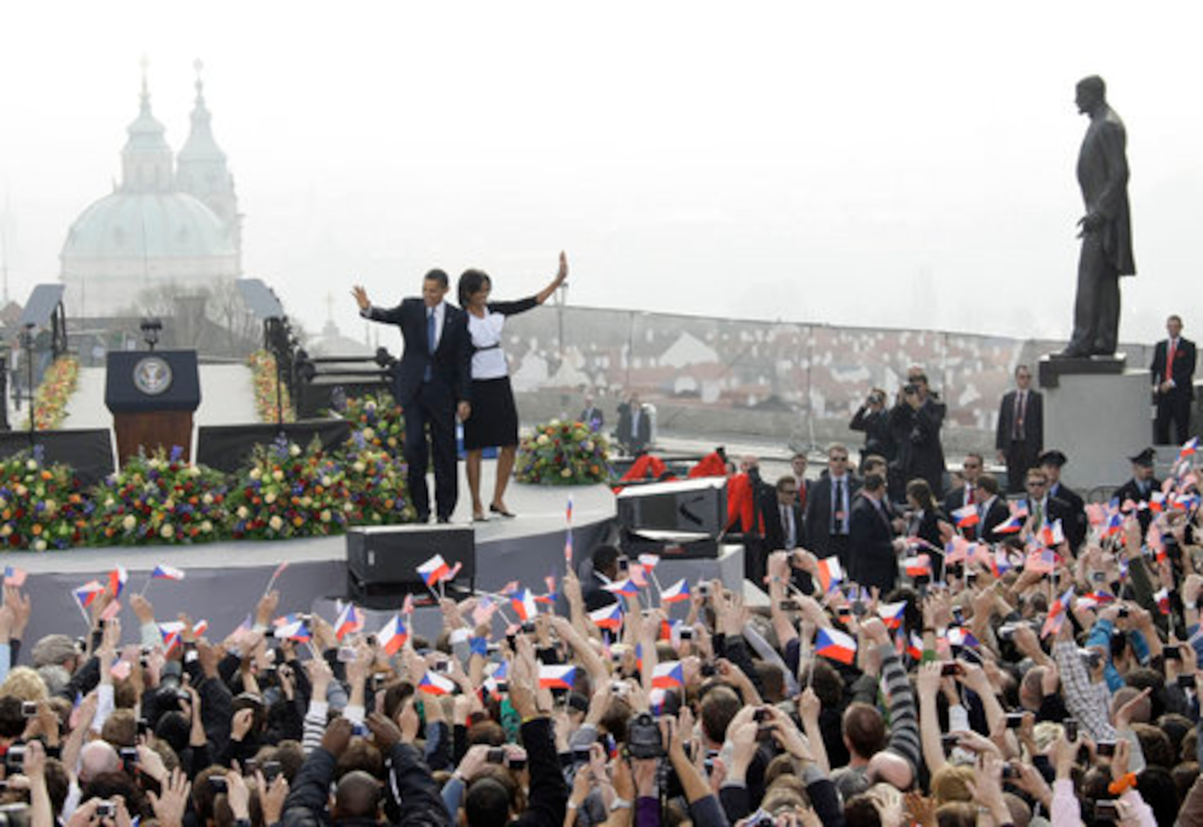 President Obama and Michelle Obama greet the crowd in front of the Castle in Prague, Czech Republic, Sunday, April 5, 2009.