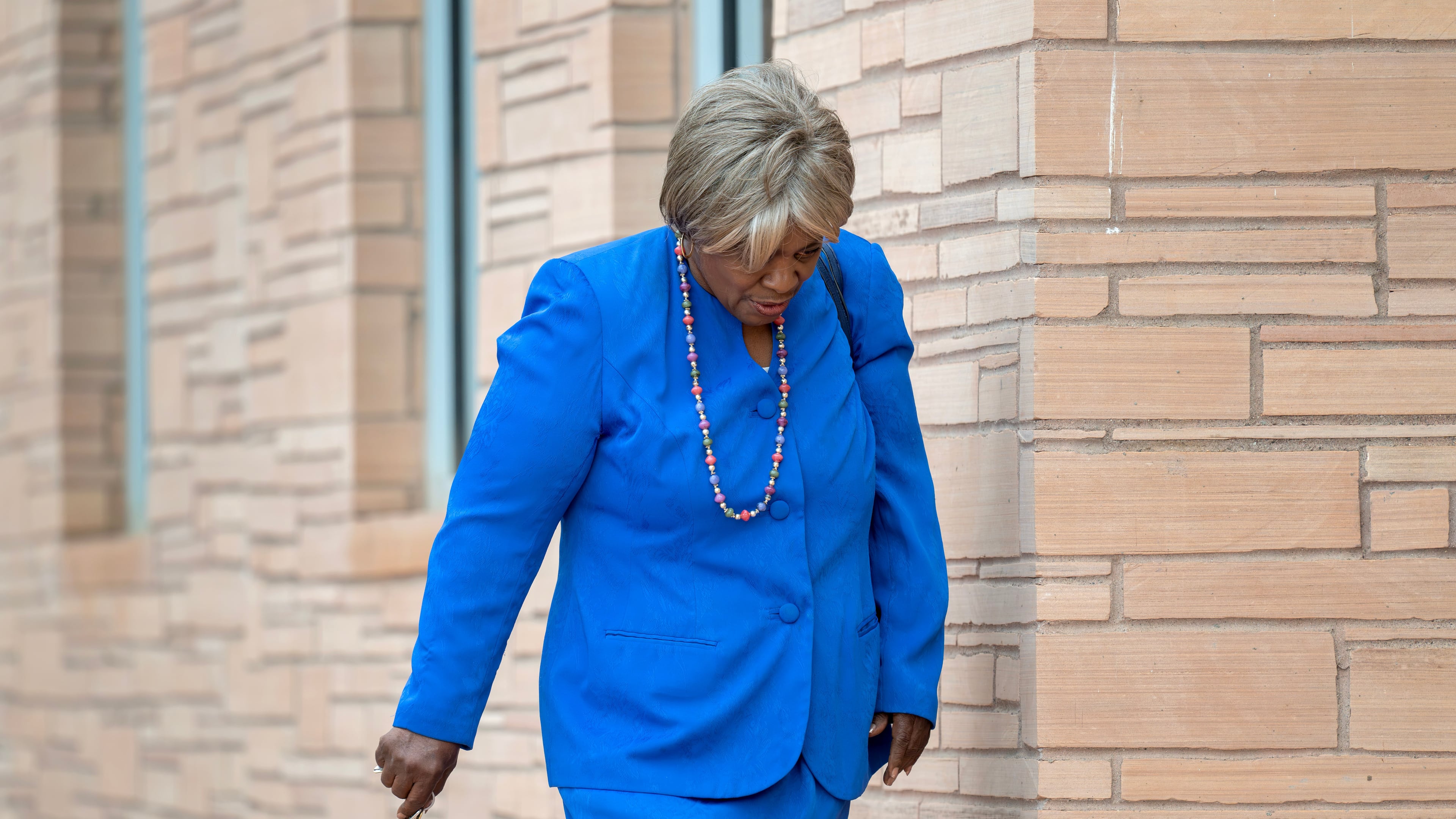 Former New Mexico House Majority Leader Sheryl Williams Stapleton walks into the federal courthouse in Albuquerque, N.M., on Friday, Aug. 14, 2026. (Eddie Moore/The Albuquerque Journal via AP)