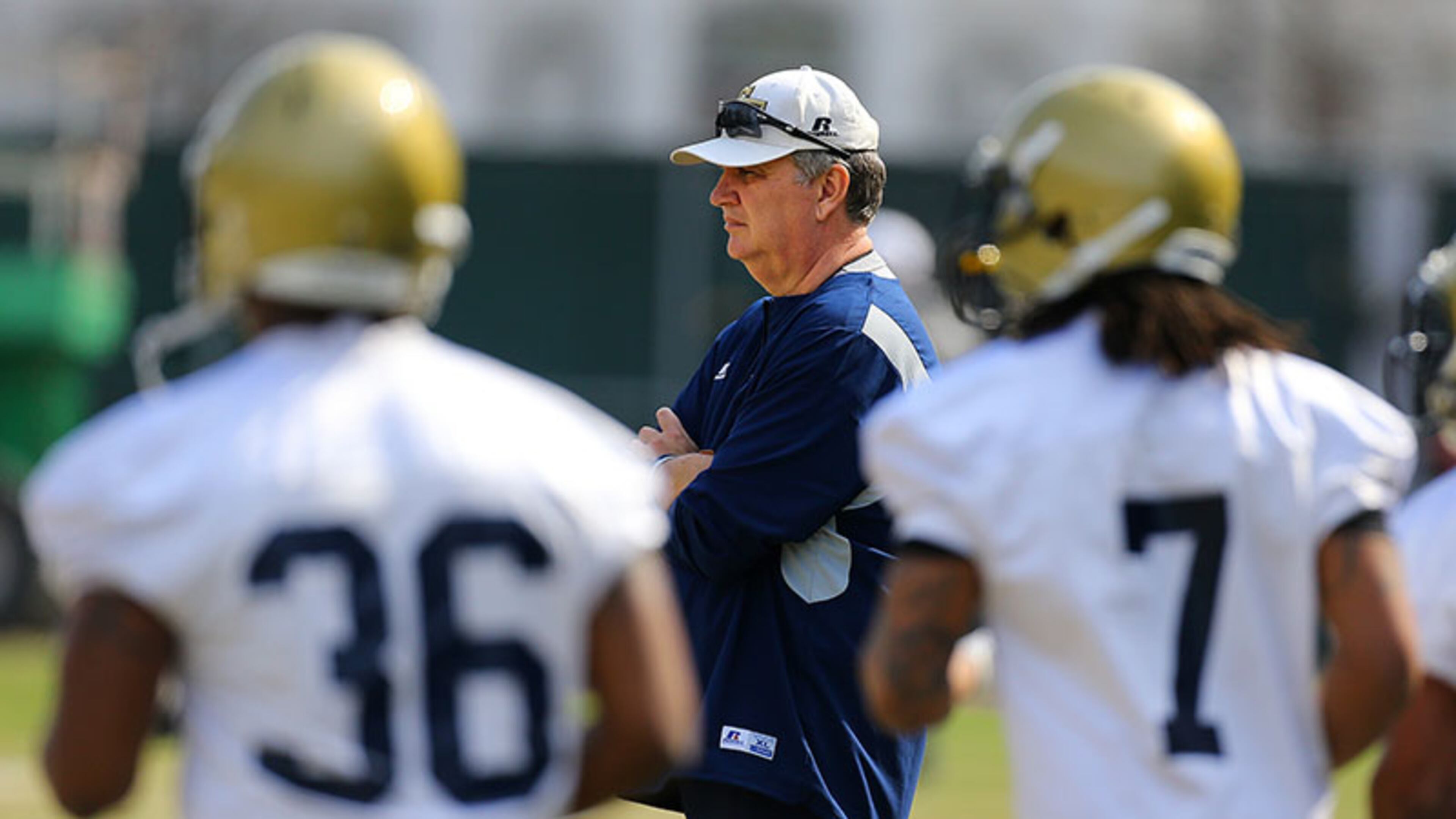 032414 ATLANTA: Georgia Tech head football coach Paul Johnson watches over the first day of spring football practice on Monday, March 24, 2014, in Atlanta. CURTIS COMPTON / CCOMPTON@AJC.COM Georgia Tech head football coach Paul Johnson watches over the first day of spring football practice Monday.