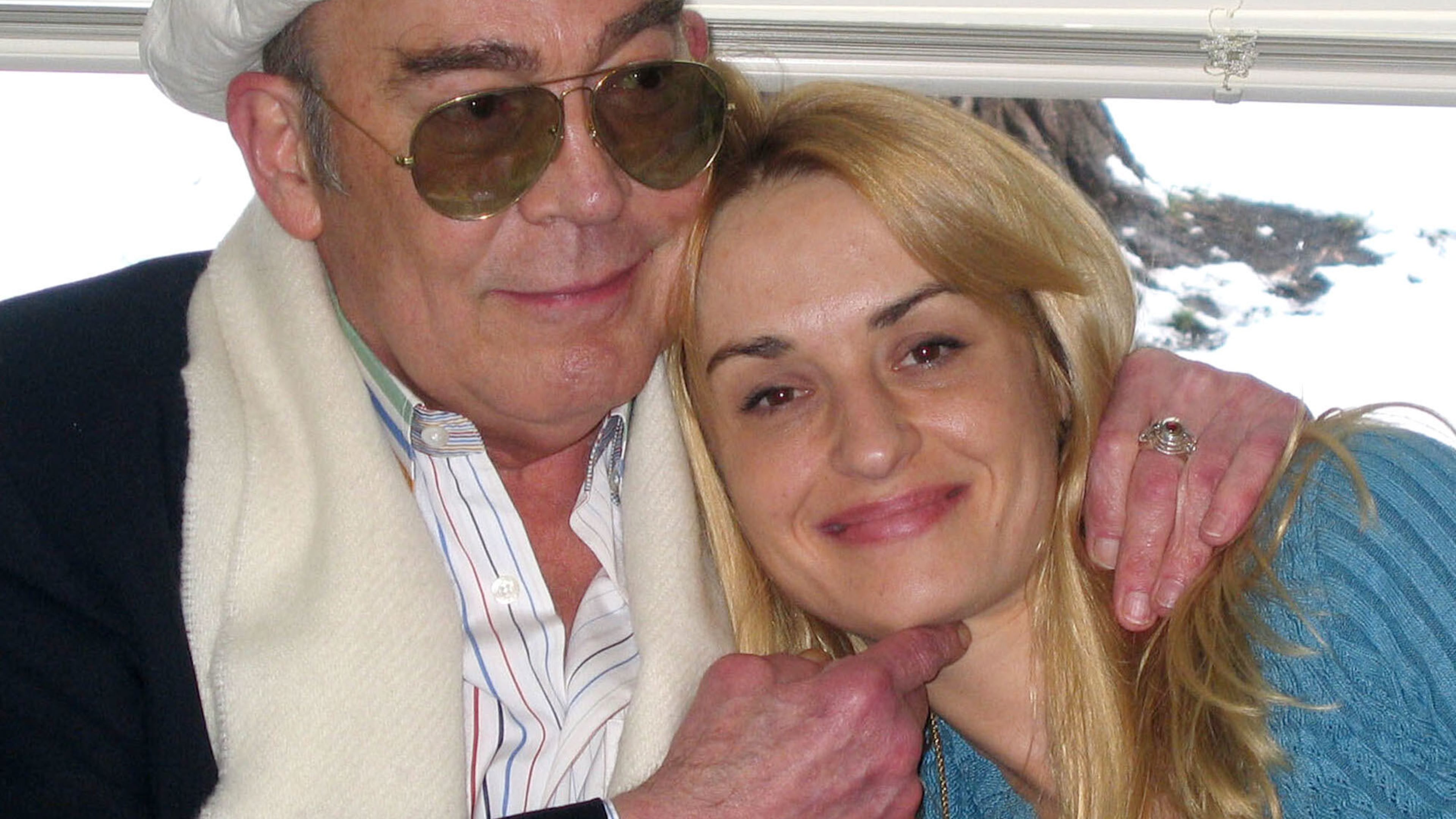 FILE - Journalist Hunter S. Thompson, left, and his wife, Anita Thompson, at the Pitkin County Court House in Aspen, Colo., on April 23, 2003, during their civil wedding ceremony. (AP Photo/Louisa Davidson, File)
