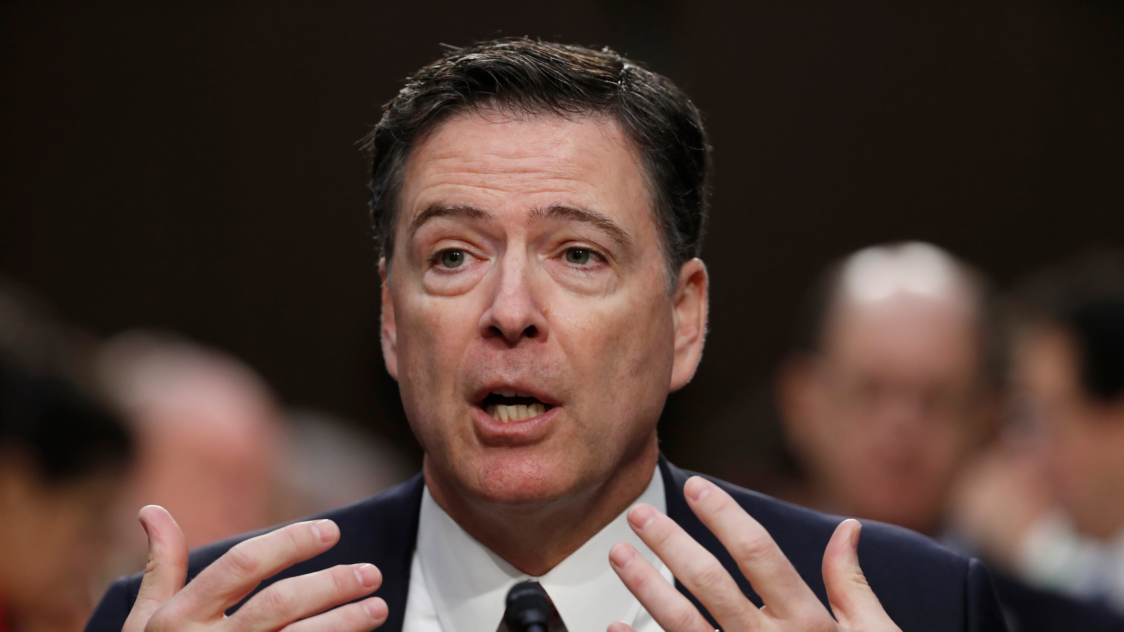 FILE - Former FBI Director James Comey speaks during a Senate Intelligence Committee hearing on Capitol Hill, Thursday, June 8, 2017, in Washington. (AP Photo/Alex Brandon, File)
